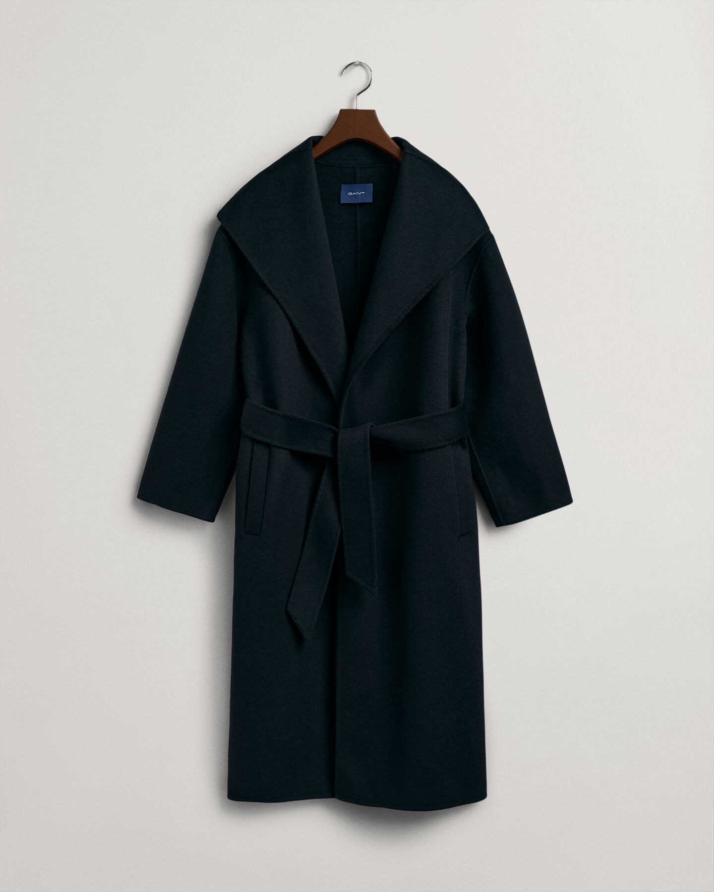 Manteau cousu main avec ceinture