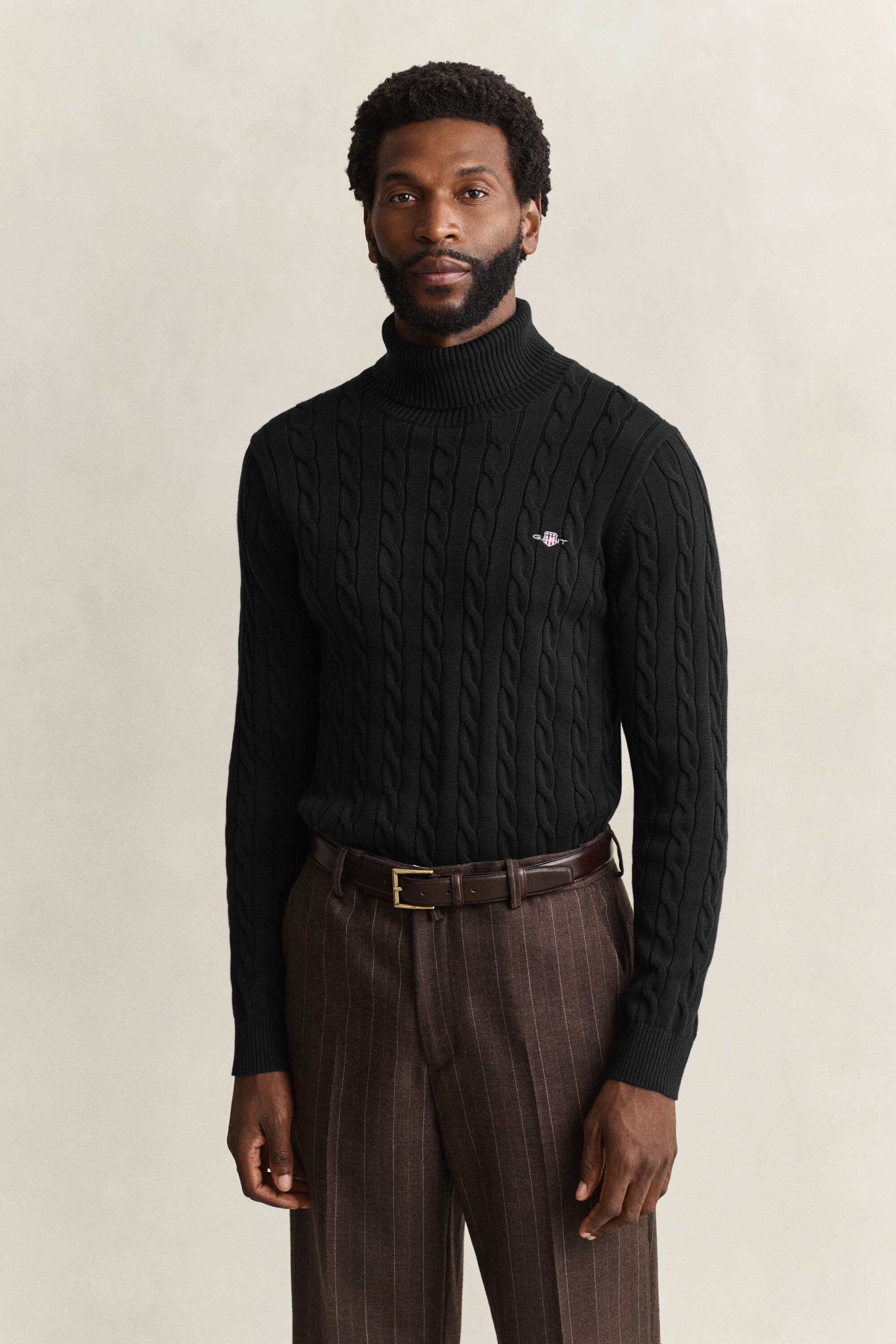 Pull col roulé en maille torsadée de coton