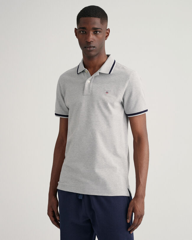 Polo en coton piqu&eacute; avec liser&eacute;s &agrave; chevrons