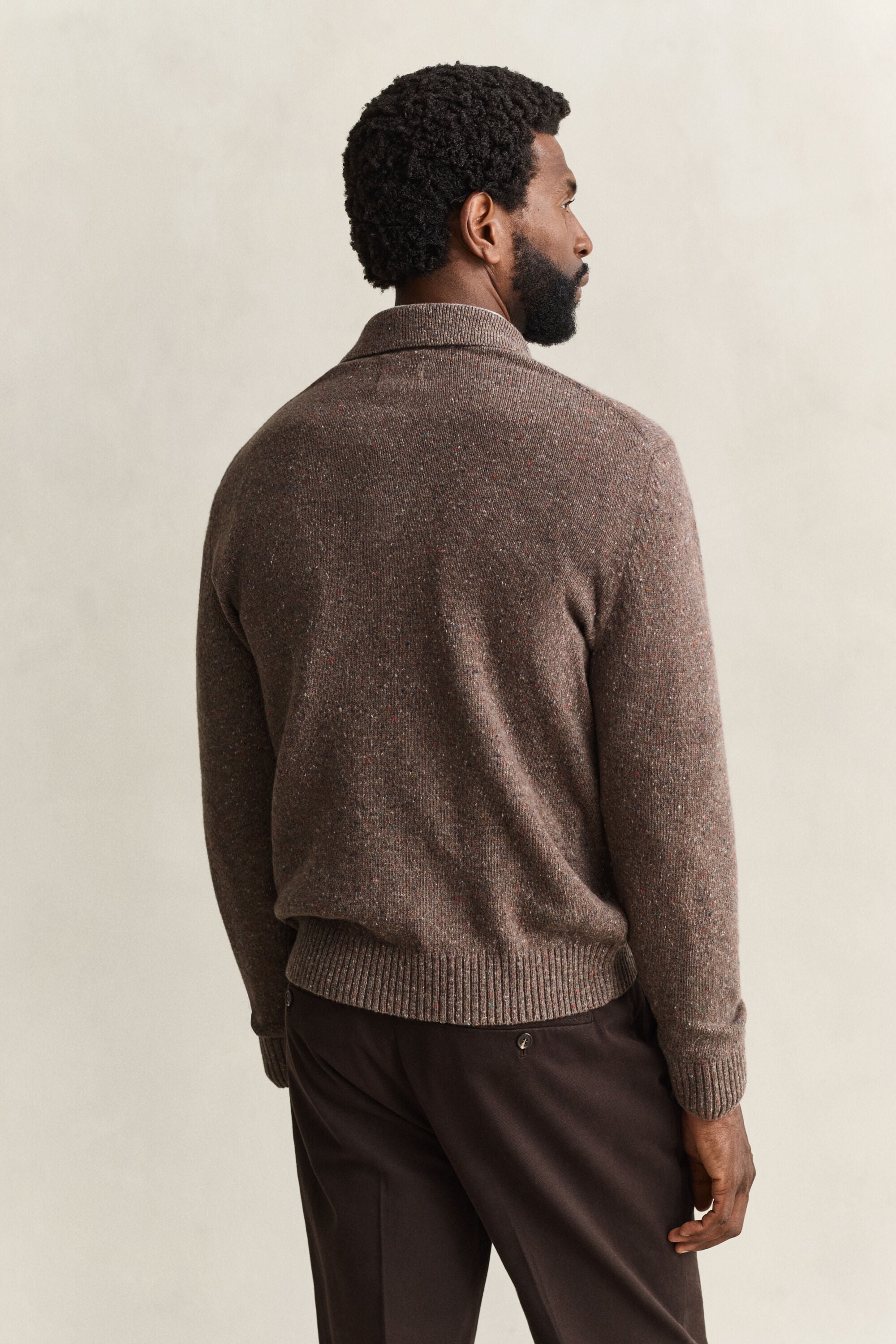Pull façon polo en laine mouchetée mélangée