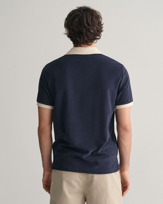 Polo en tissu éponge esprit vacances