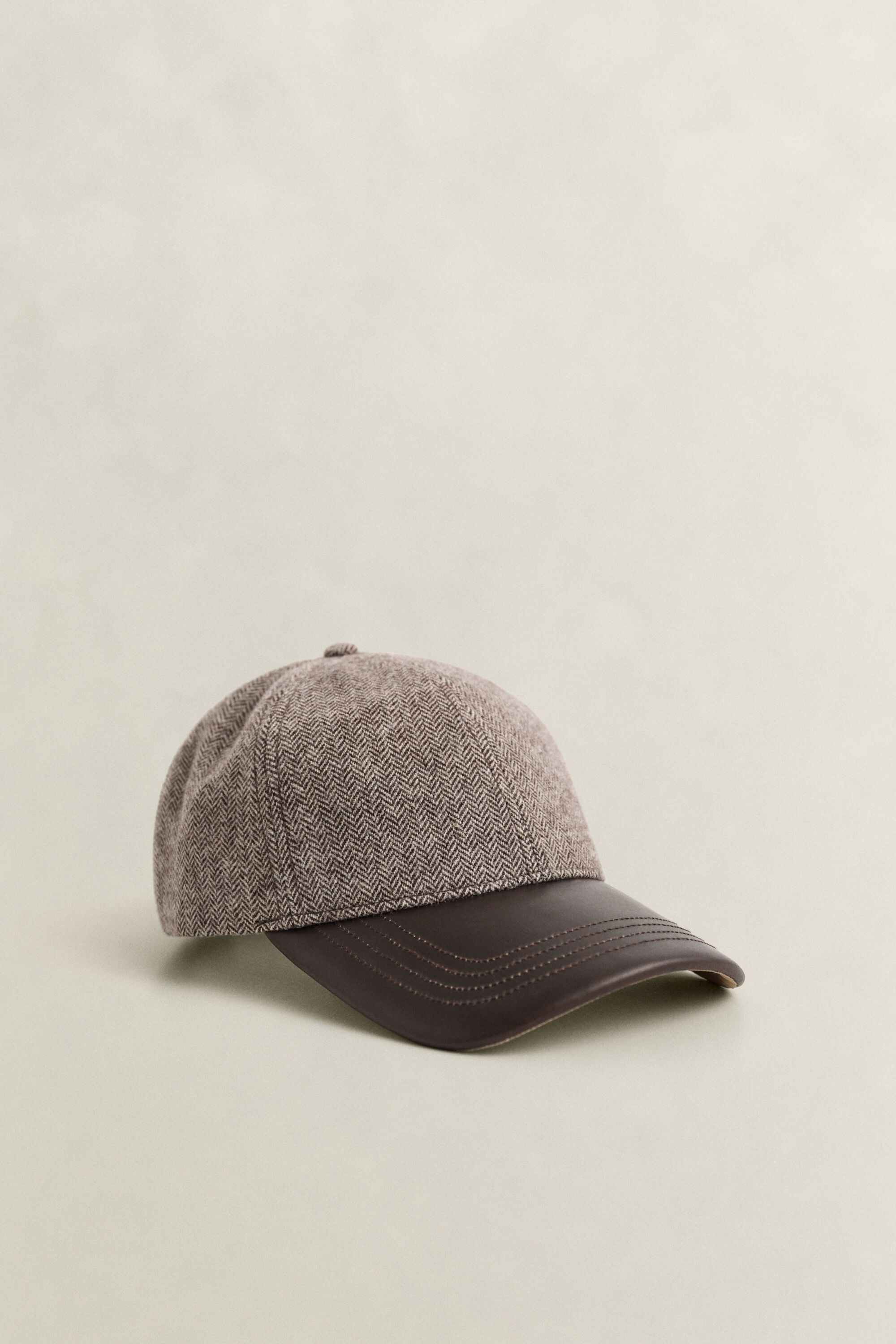 Casquette en laine mélangée avec visière en cuir