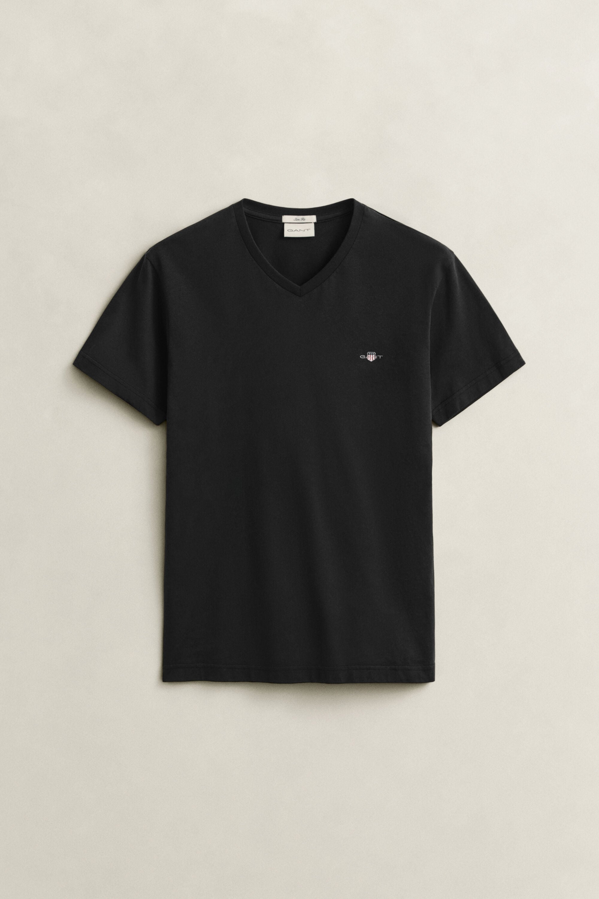 T-shirt col V avec écusson