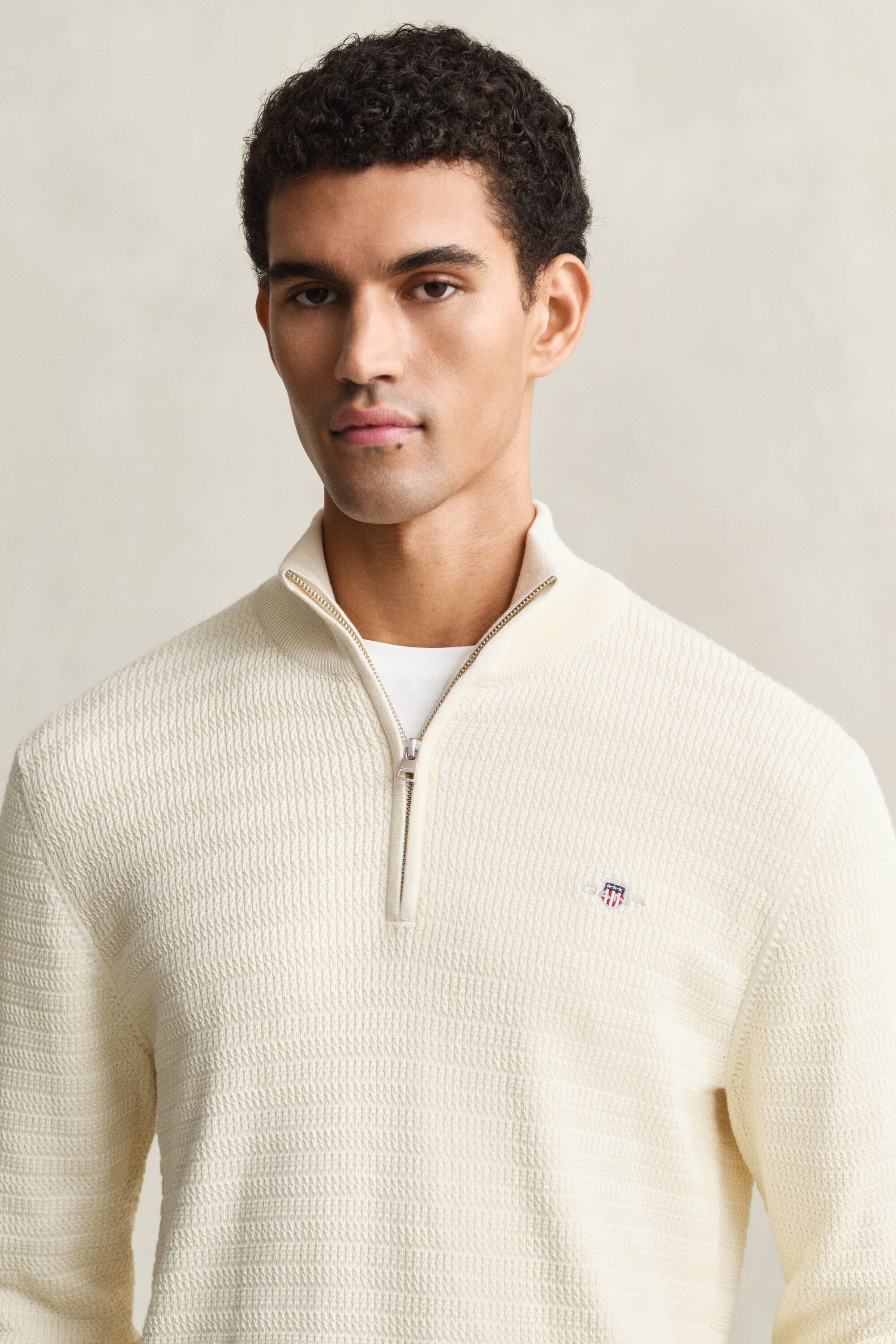 Pull à demi-zip en maille torsadée