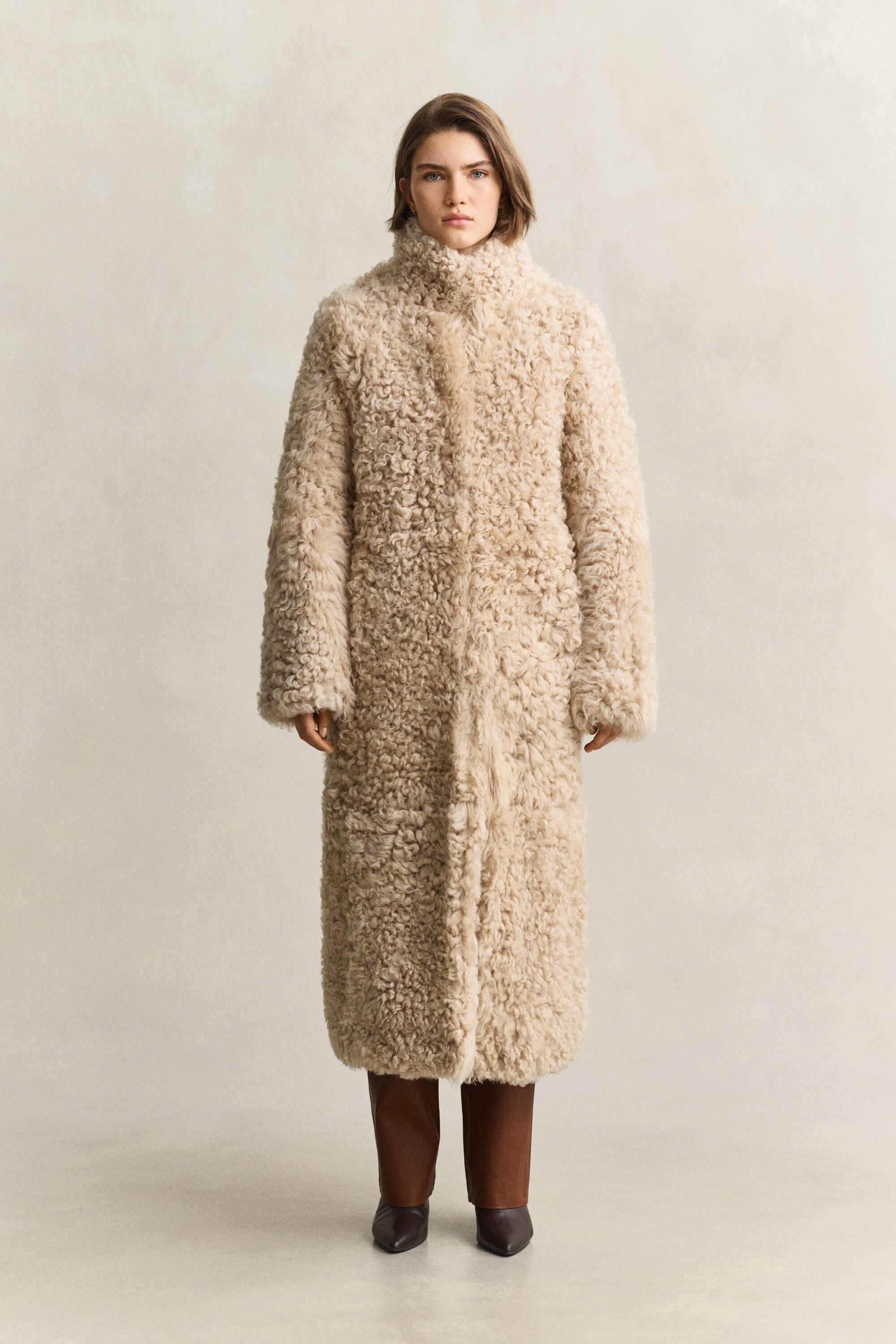 Manteau en peau lainée