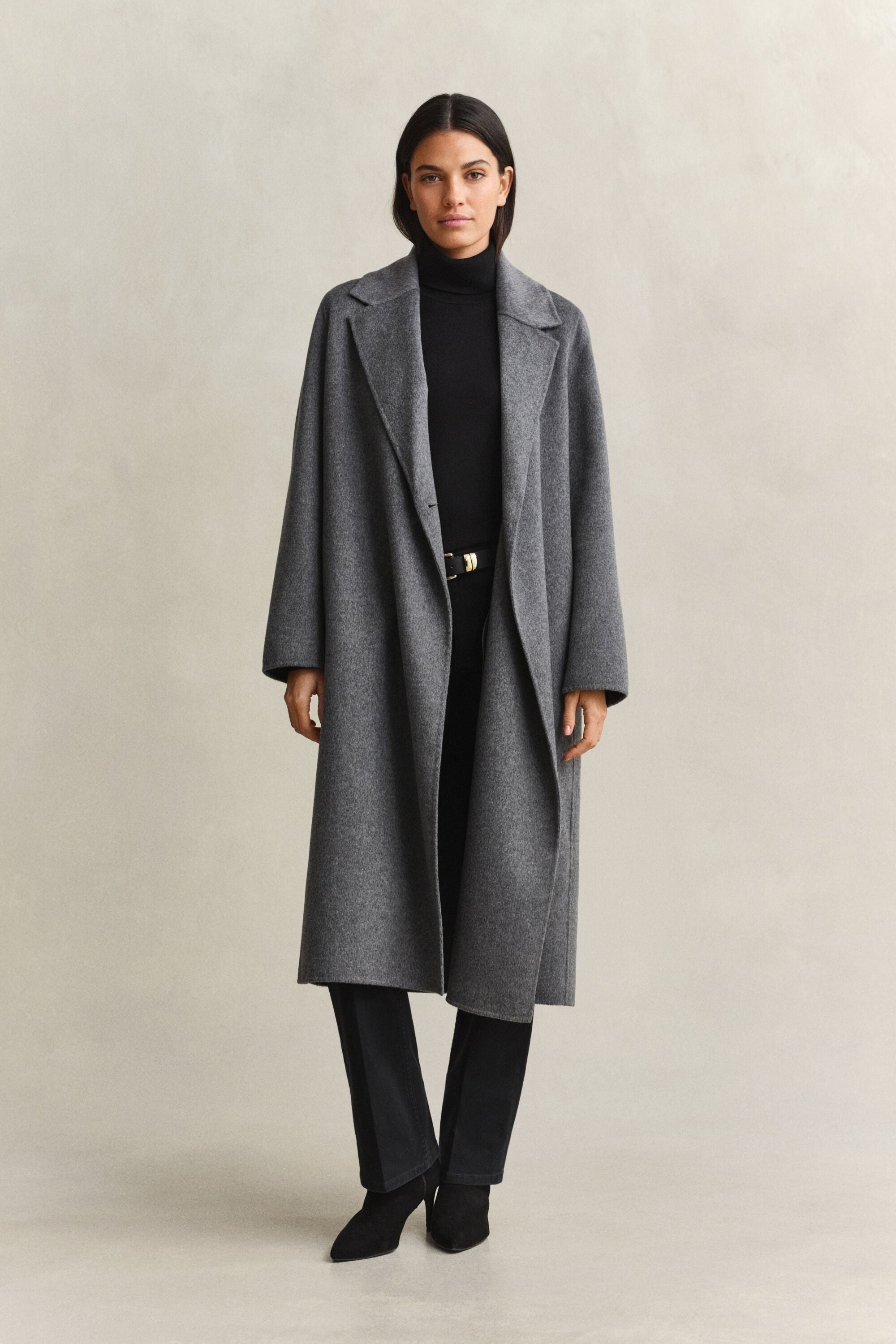 Manteau cousu main avec ceinture