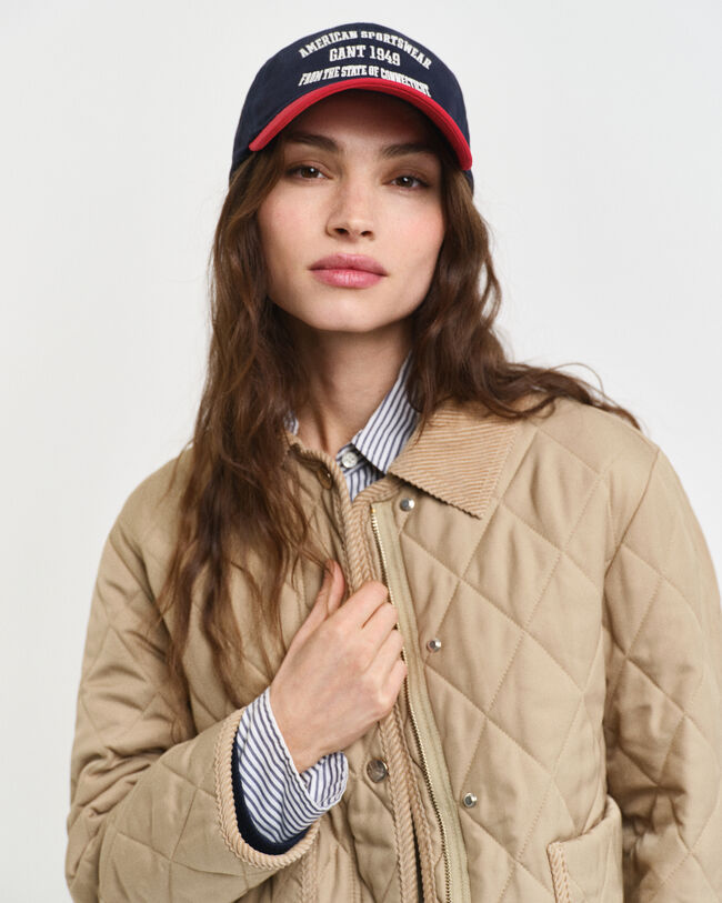 Veste matelassée avec finitions en velours côtelé