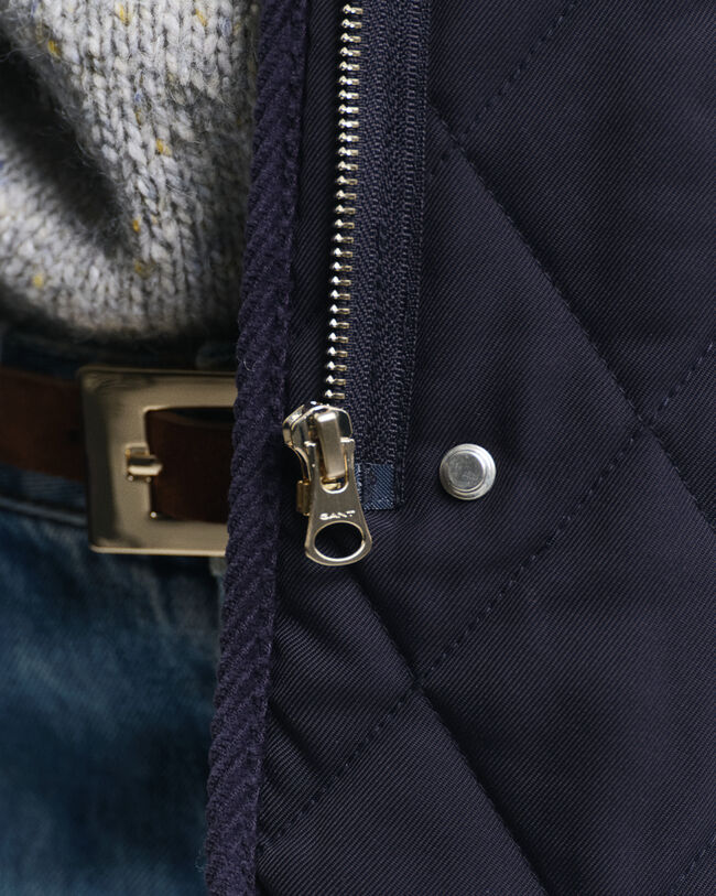 Doudoune sans manches matelass&eacute;e avec finitions en velours c&ocirc;tel&eacute;