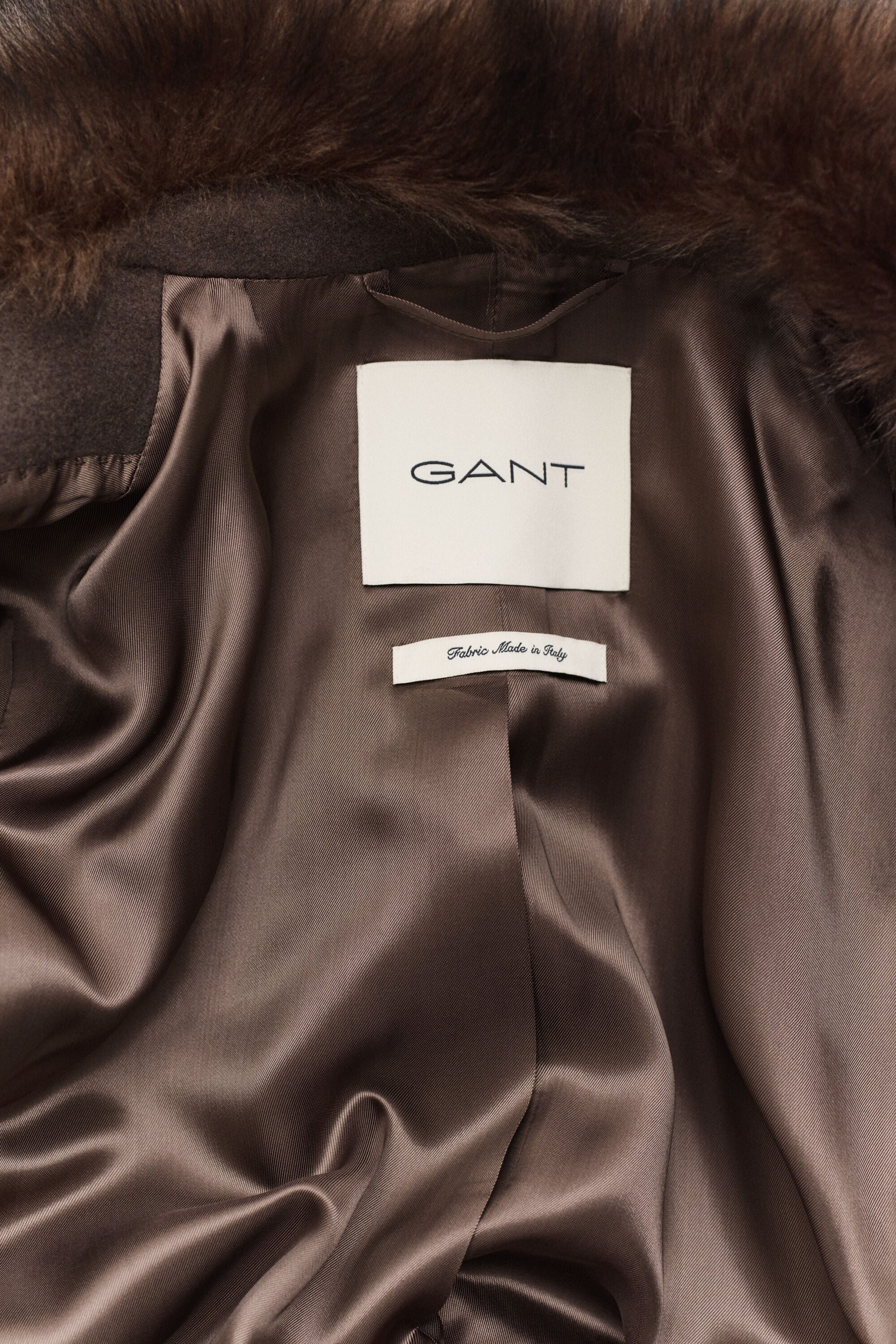 Manteau avec col en peau retournée