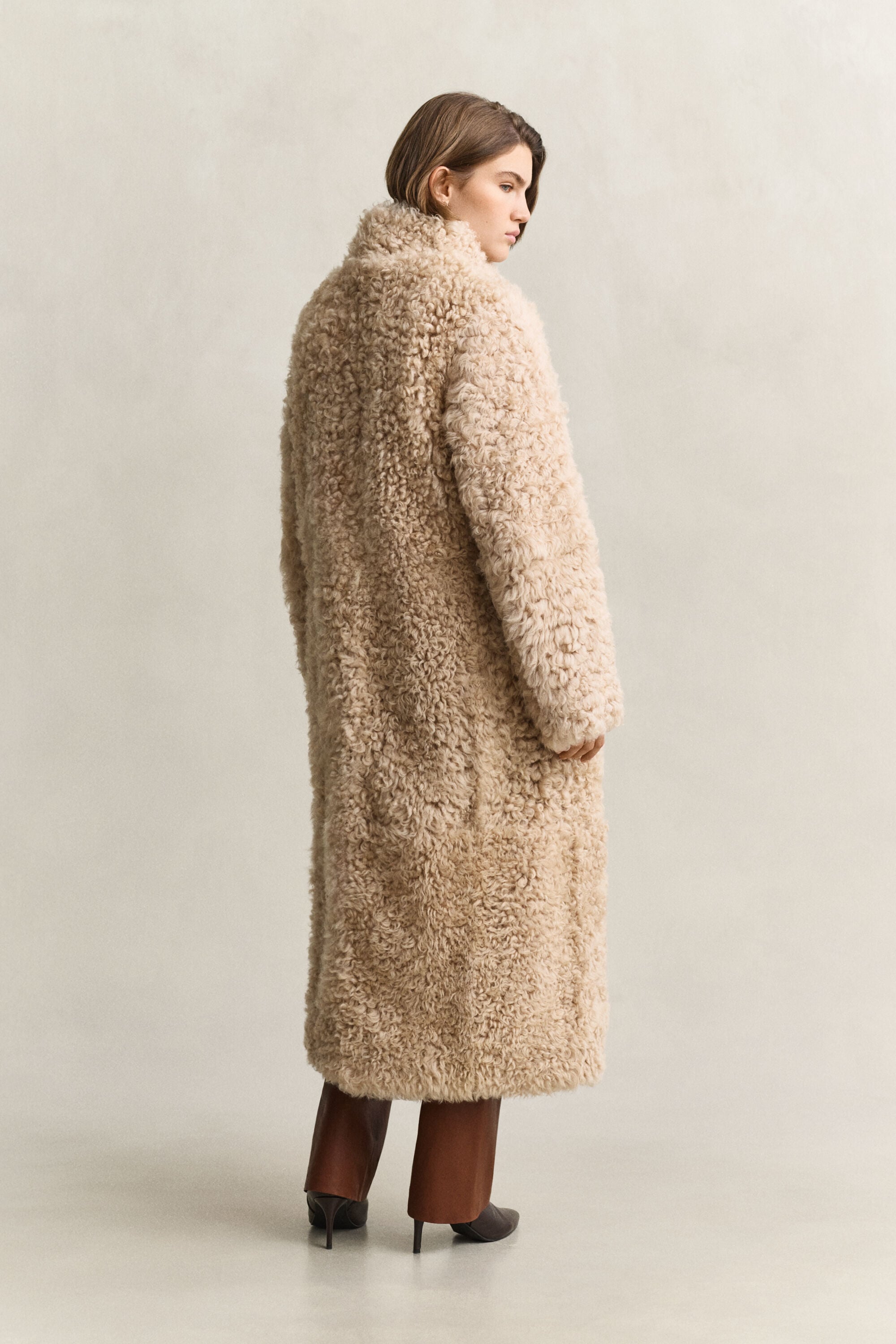 Manteau en peau lainée
