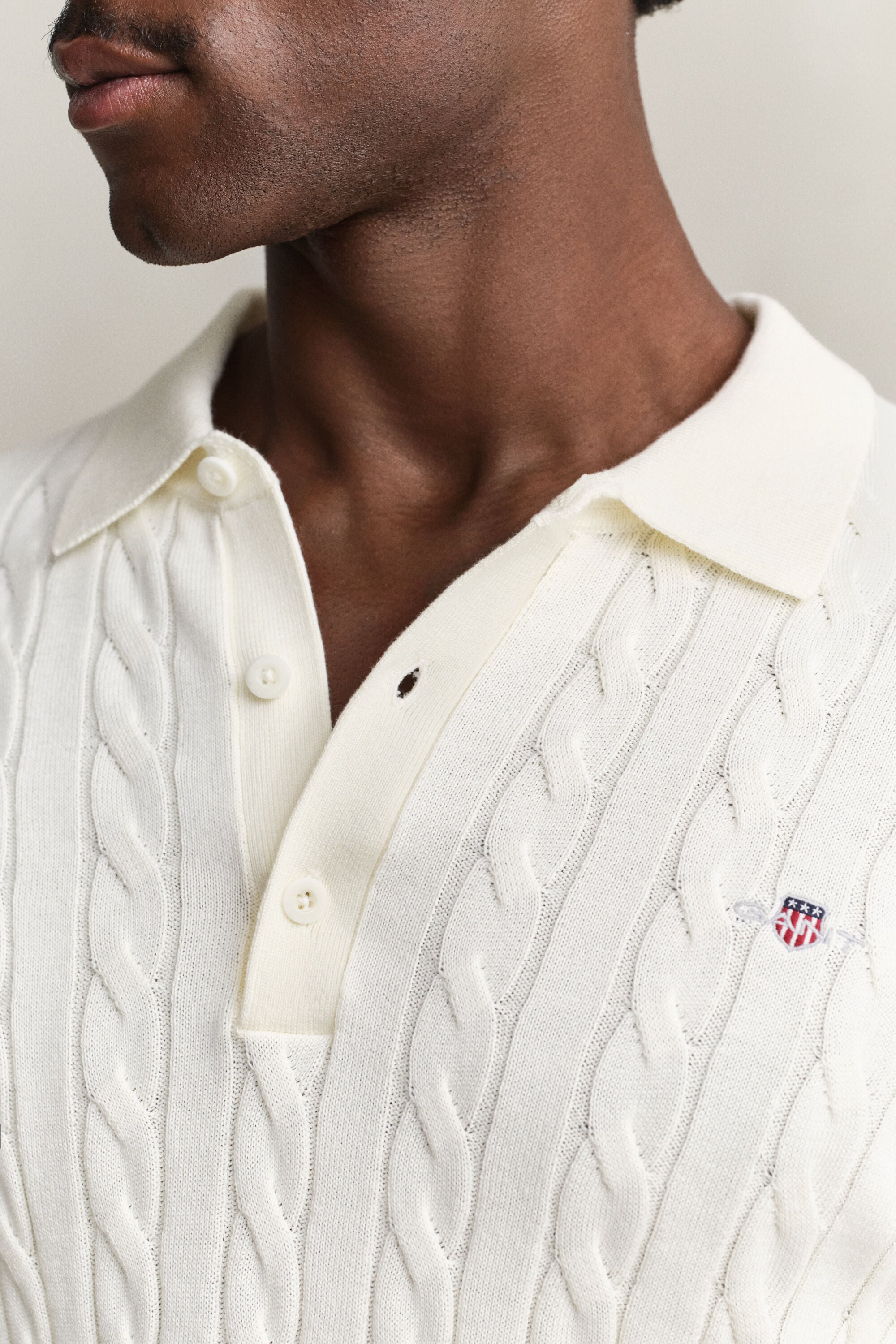 Pull façon polo en maille de coton à torsades