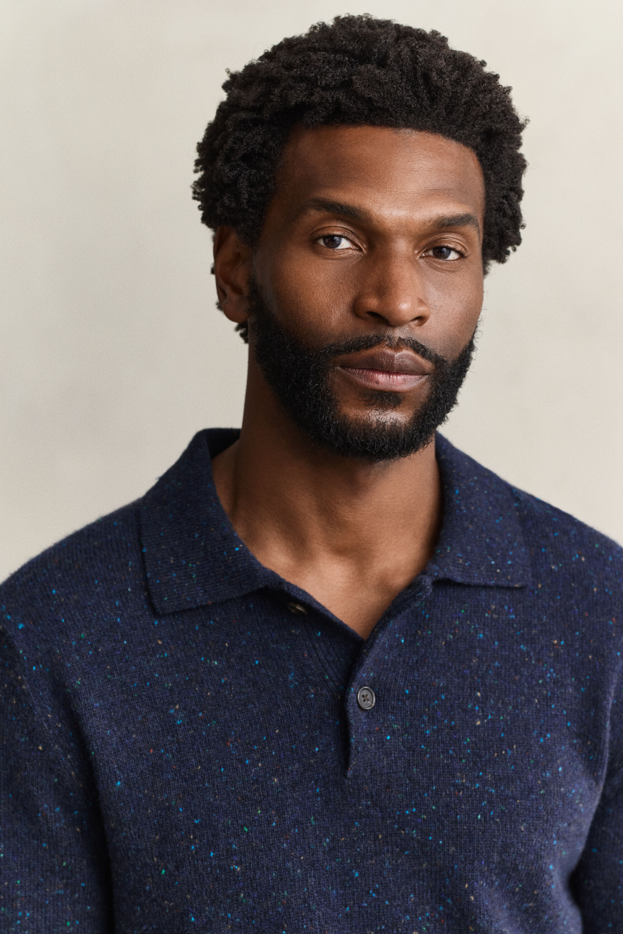 Pull façon polo en laine mouchetée mélangée