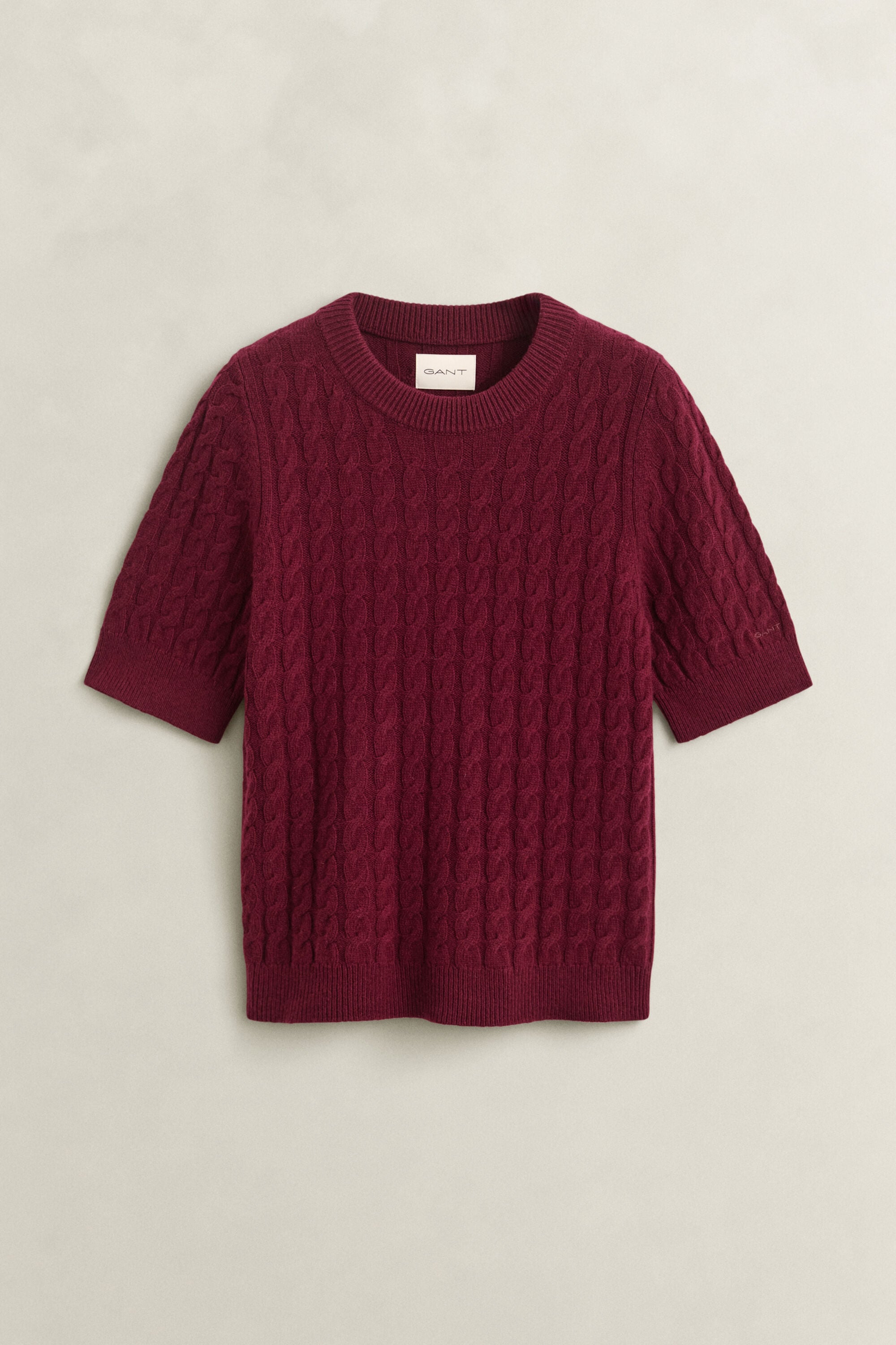 Pull à manches courtes en laine et cachemire à maille torsadée