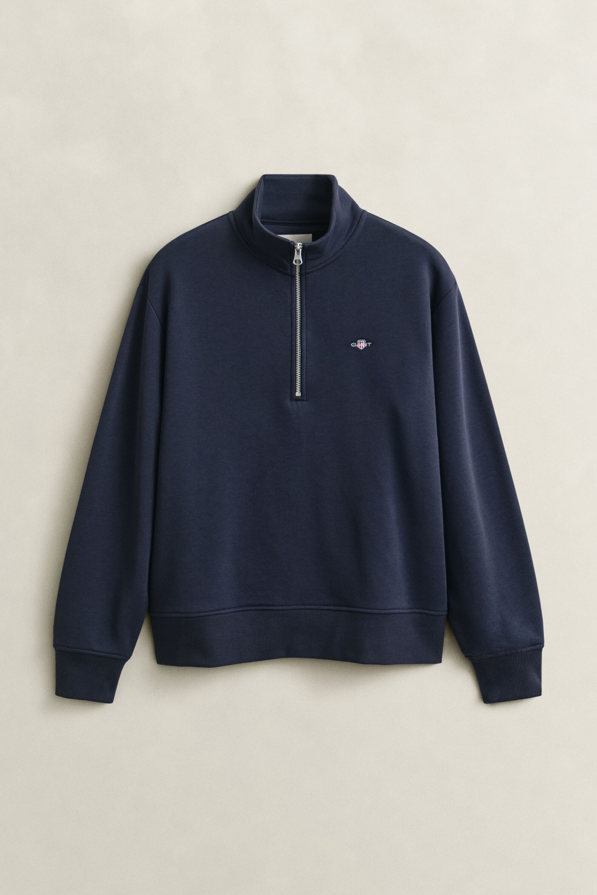 Sweat-shirt à demi-zip avec écusson