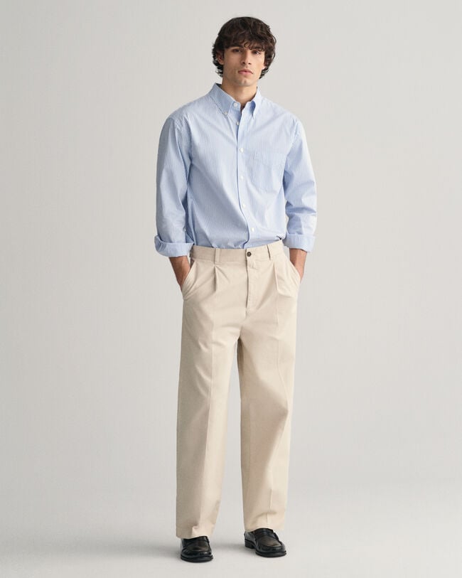 Pantalon chino relaxed fit en coton bross&eacute;