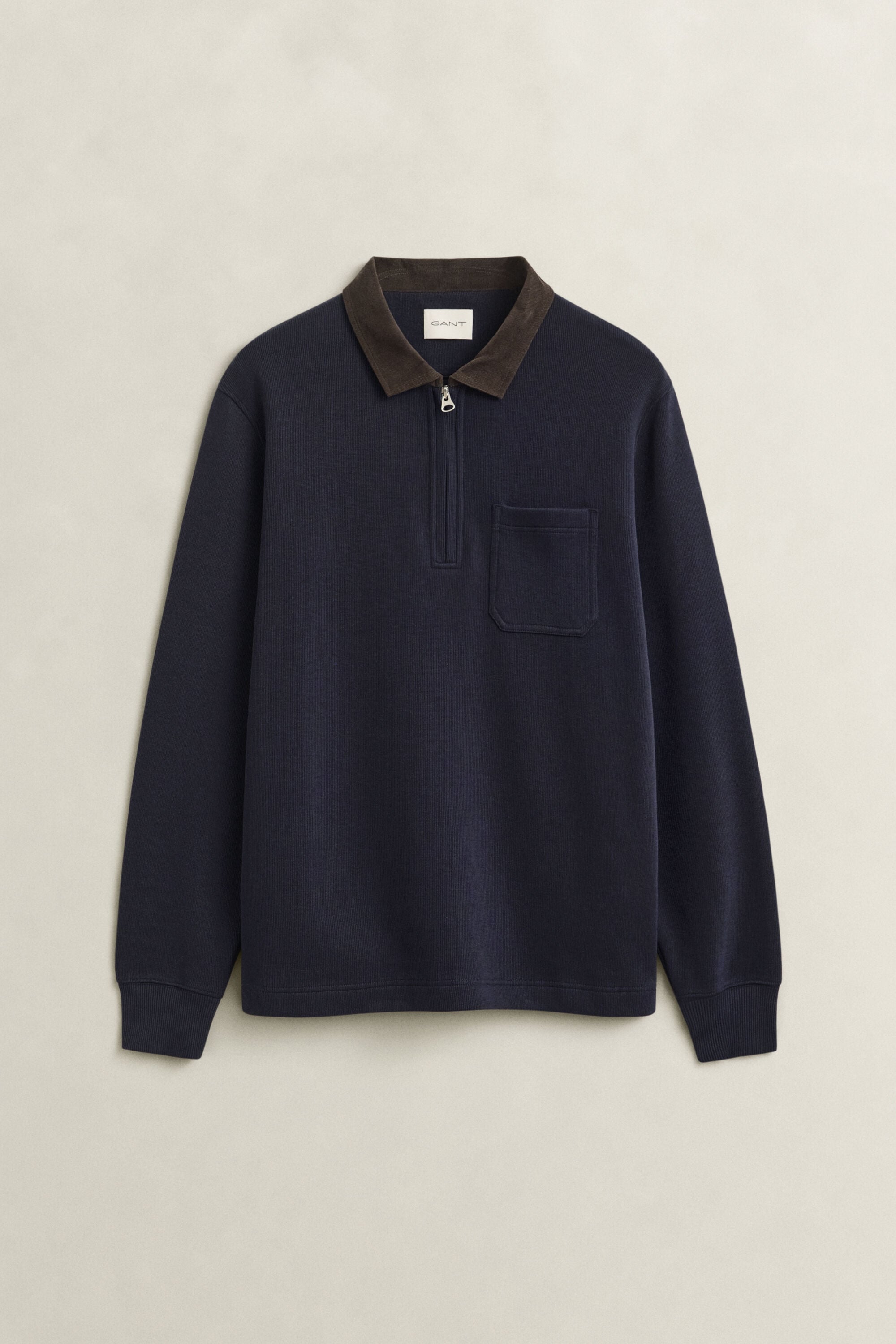 Polo Rugger à demi-zip
