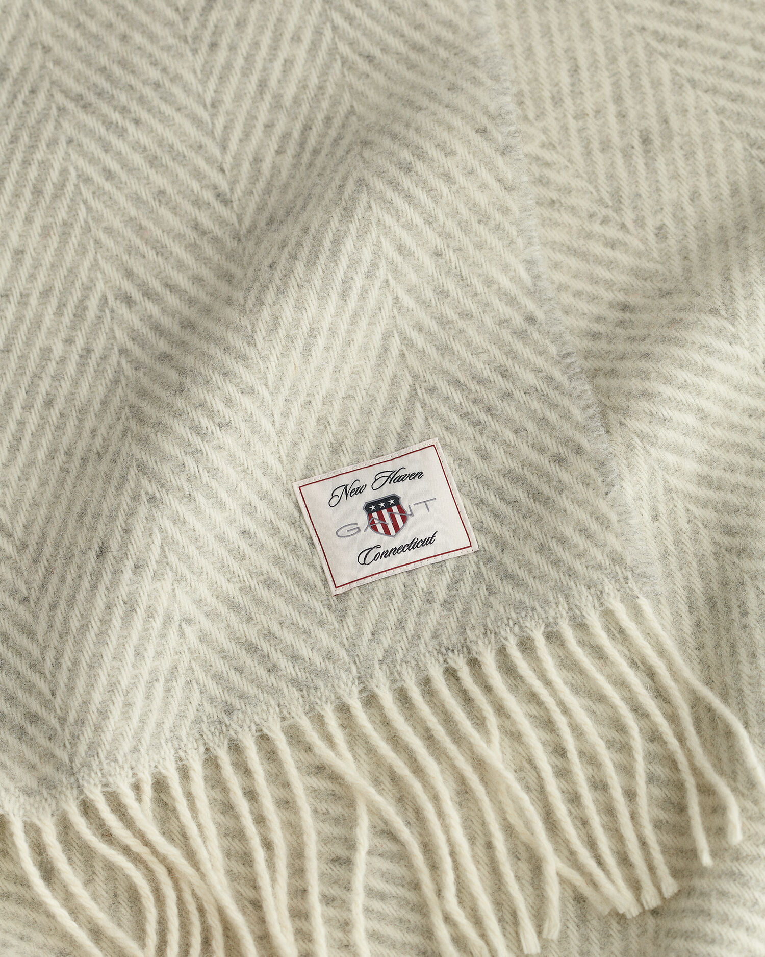 Jeté de lit en laine à chevrons