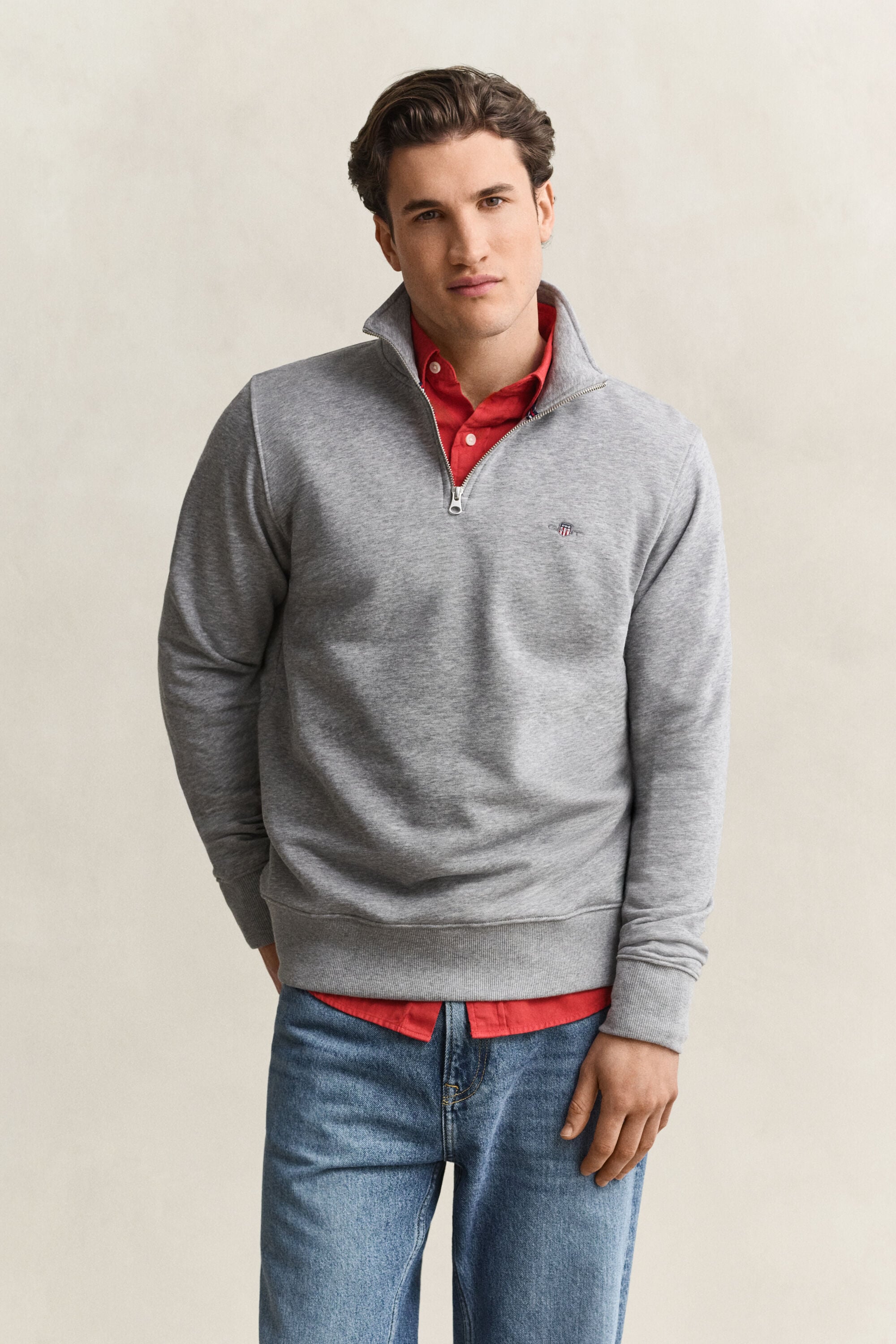 Sweat-shirt à demi-zip avec écusson