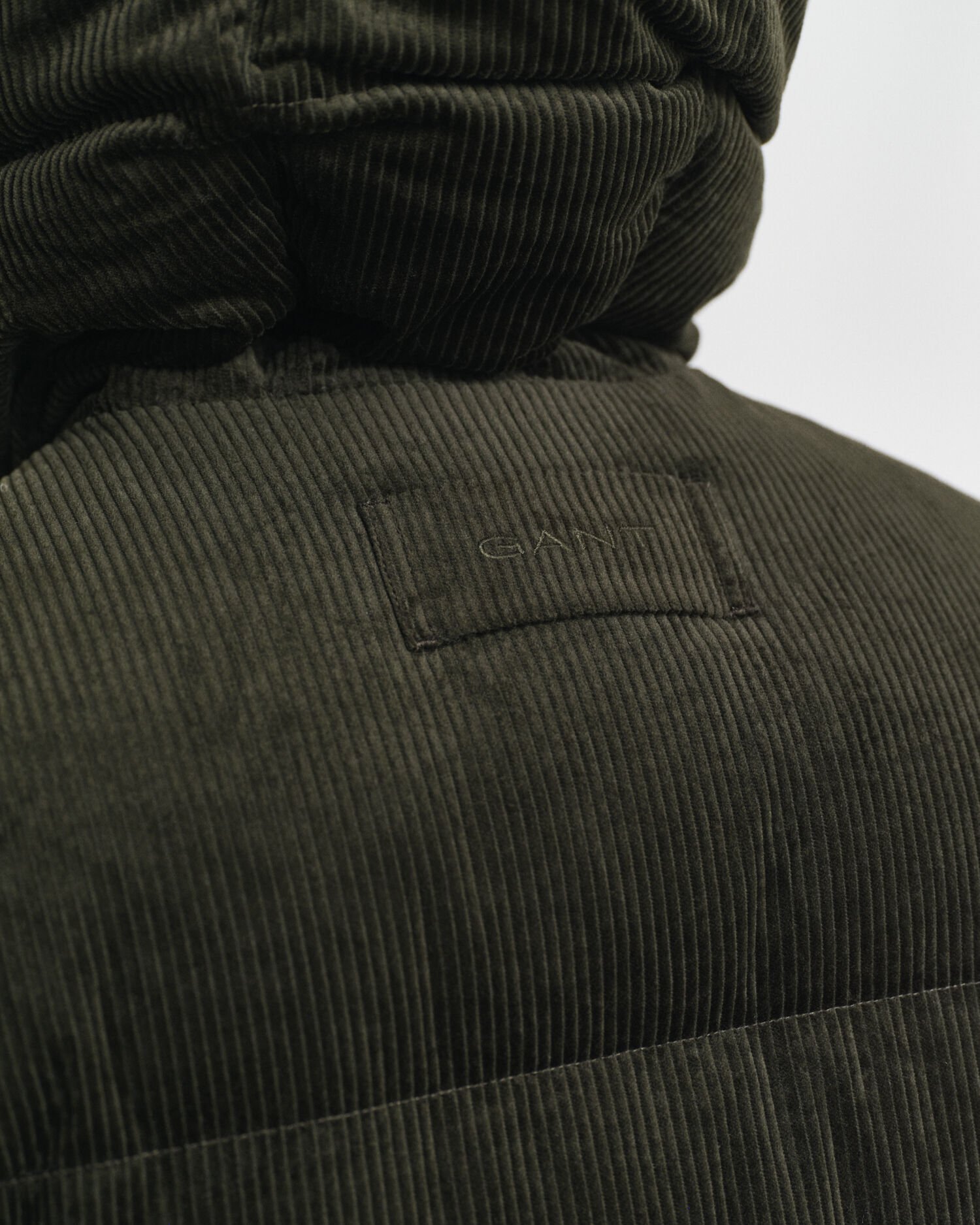 Doudoune en duvet et velours côtelé