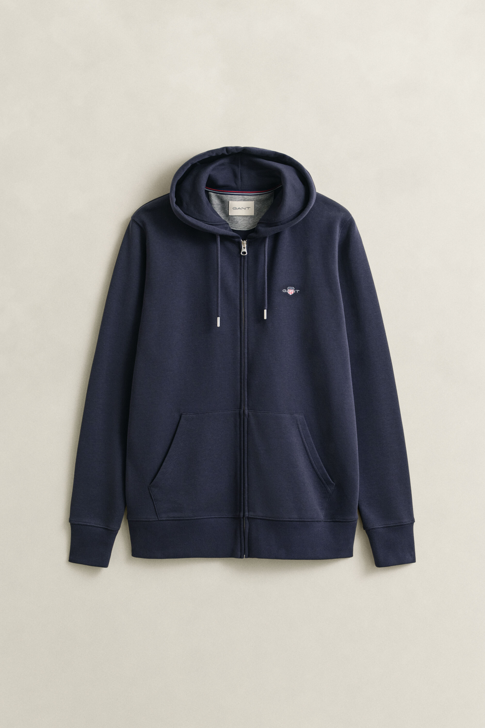 Sweat à capuche zippé avec écusson