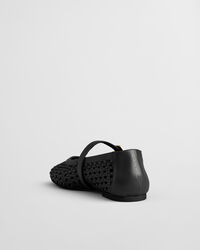 Sandales plates en cuir tress&eacute; Chadii