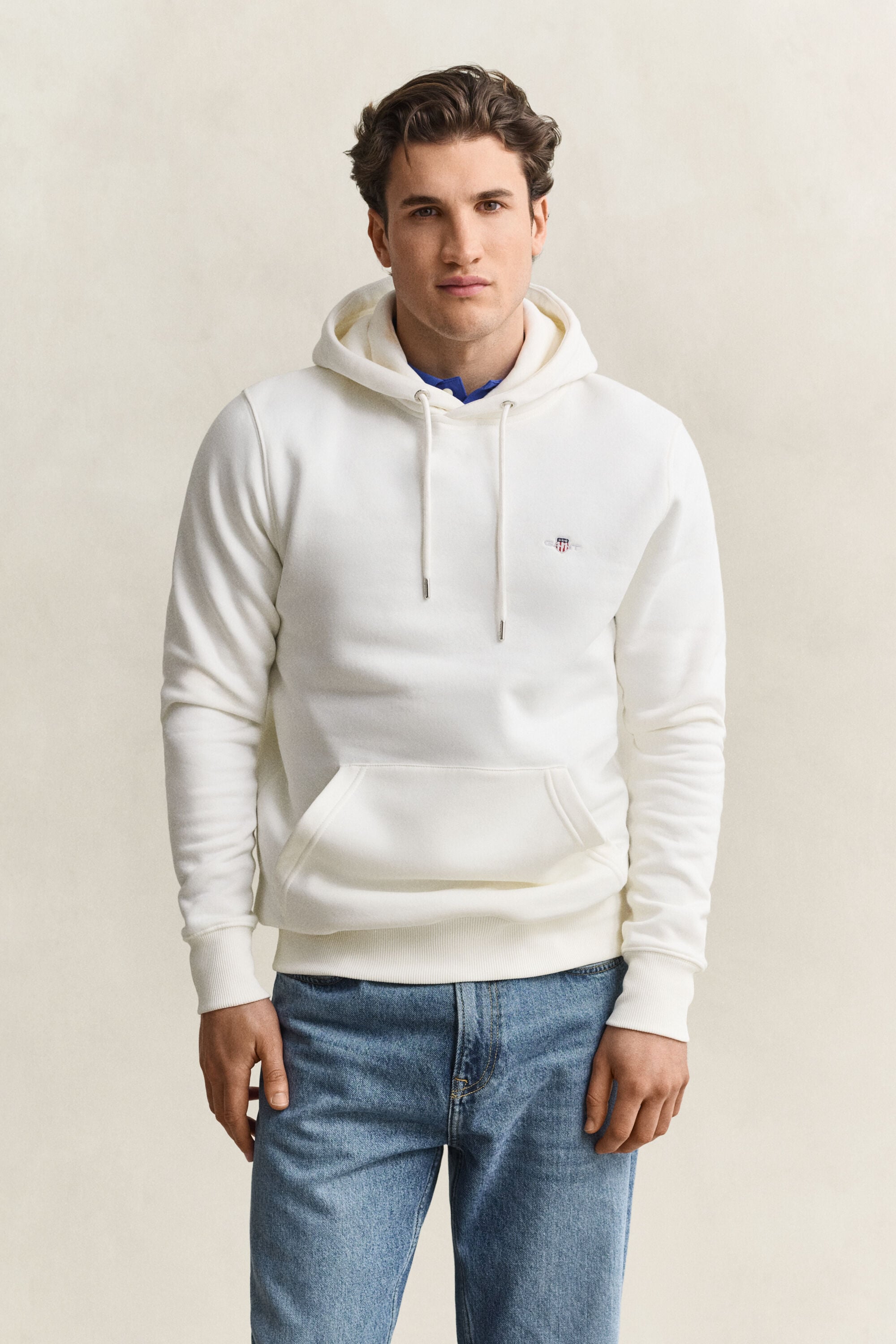Sweat à capuche avec écusson