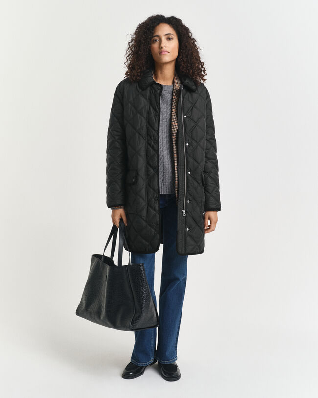 Manteau matelassé avec bord en velours côtelé