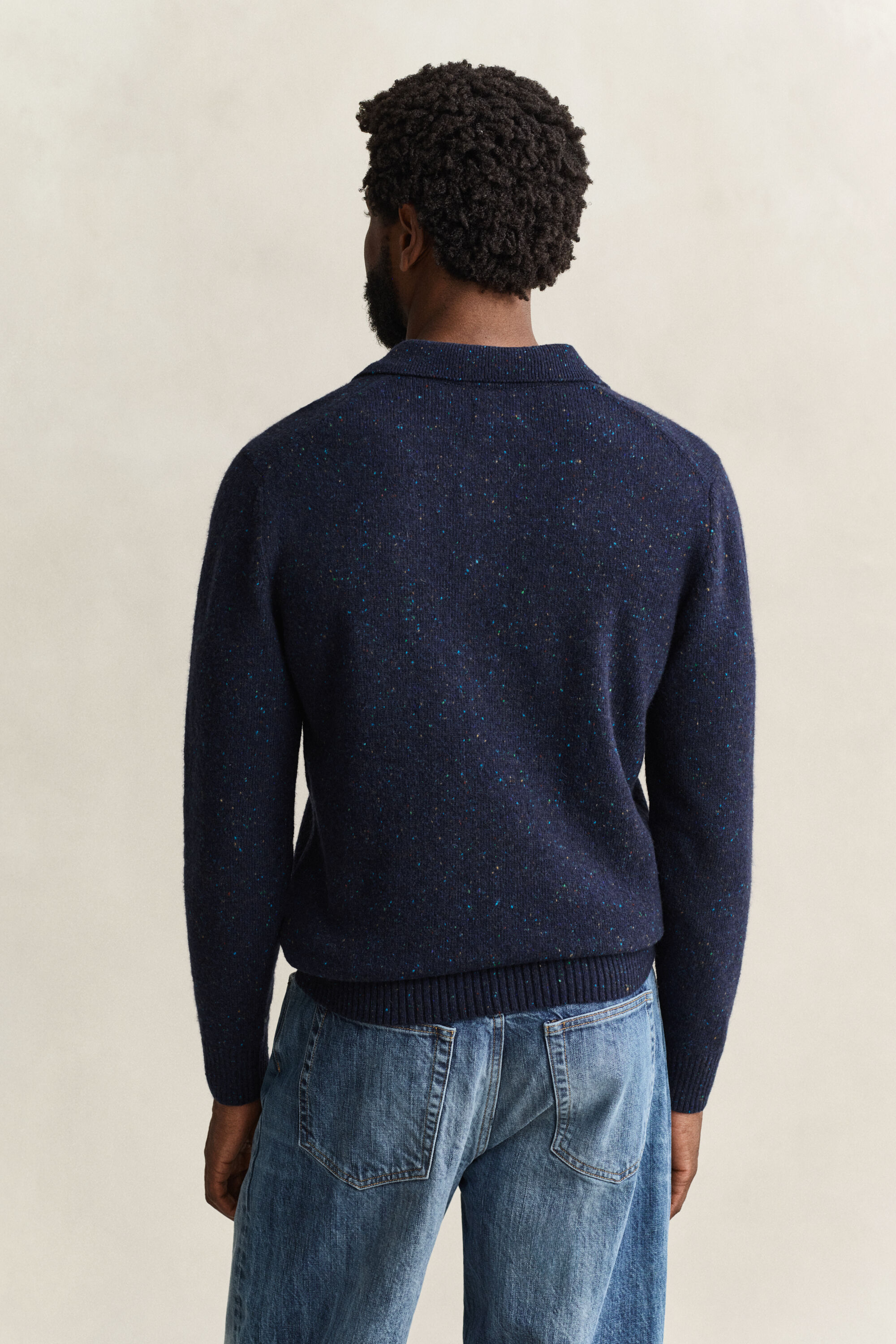 Pull façon polo en laine mouchetée mélangée