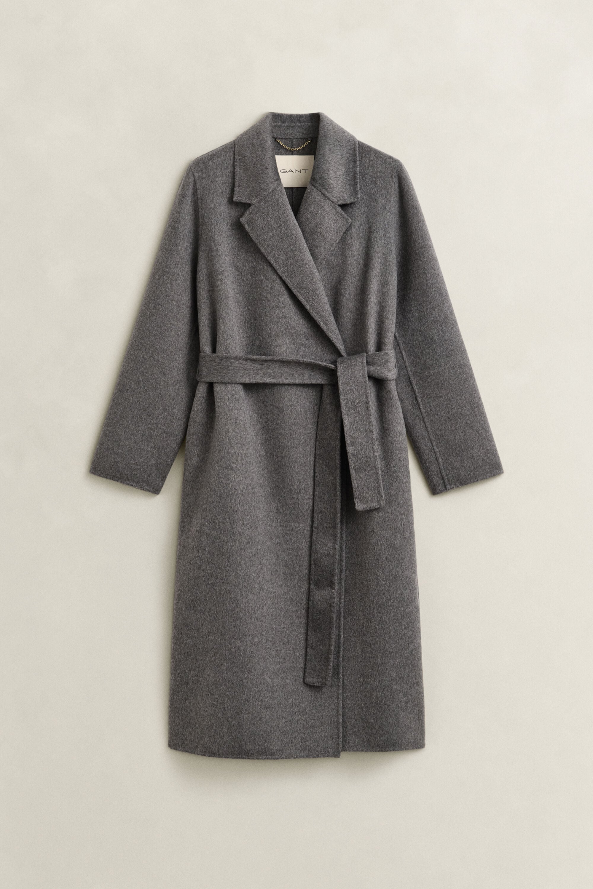 Manteau cousu main avec ceinture