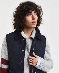 Doudoune sans manches matelass&eacute;e avec finitions en velours c&ocirc;tel&eacute;