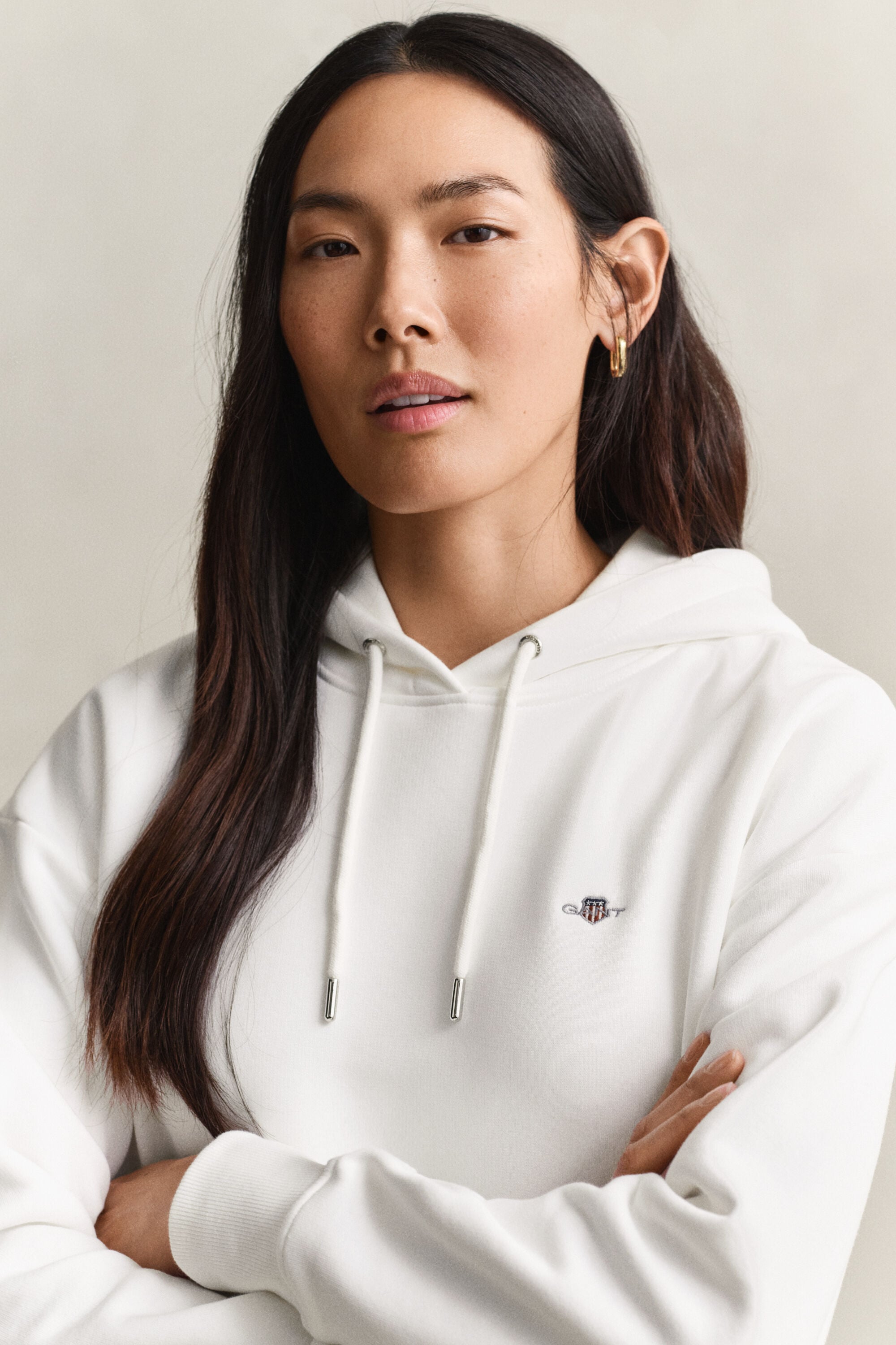 Sweat à capuche avec écusson