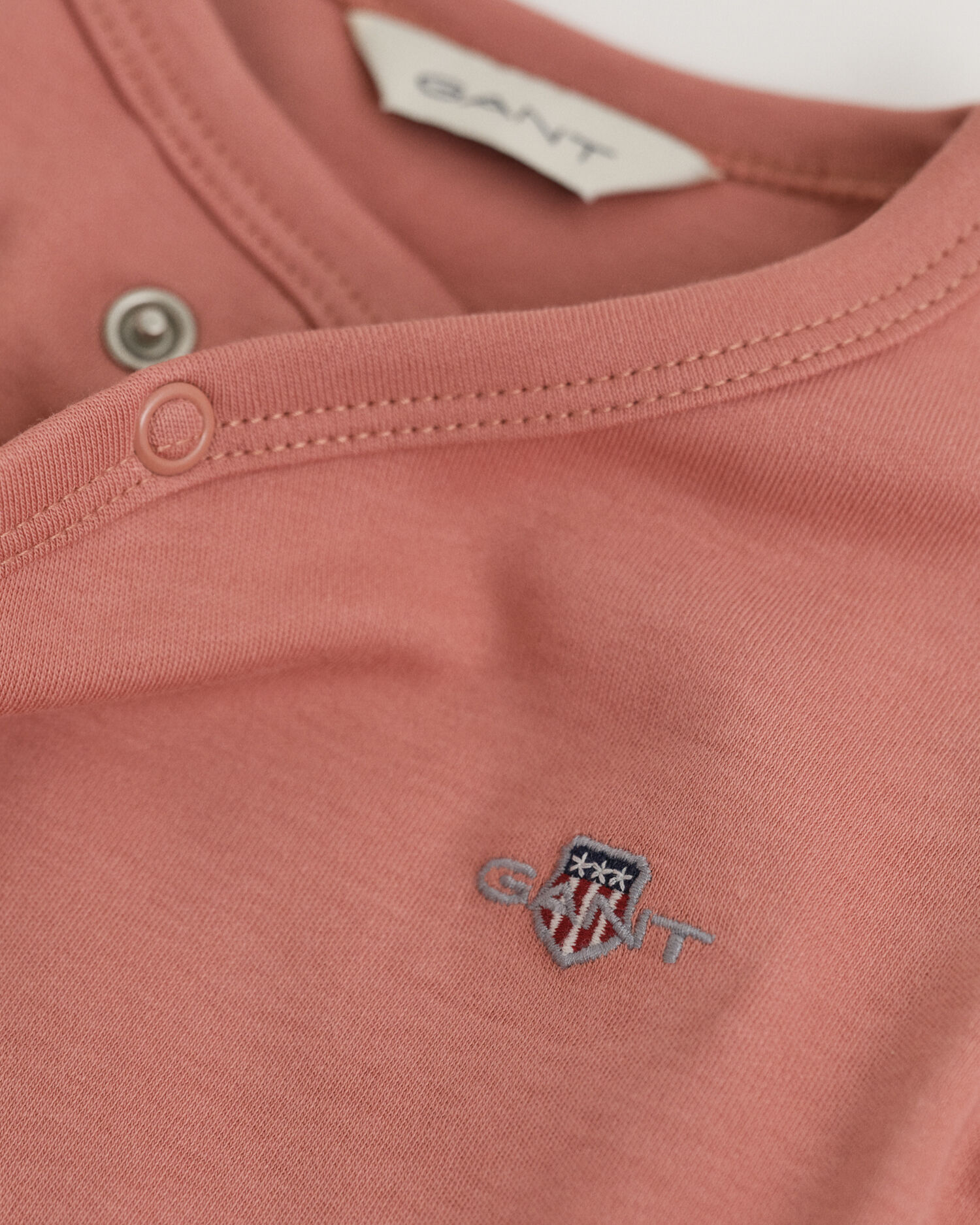 Body à manches longues avec écusson Bébé