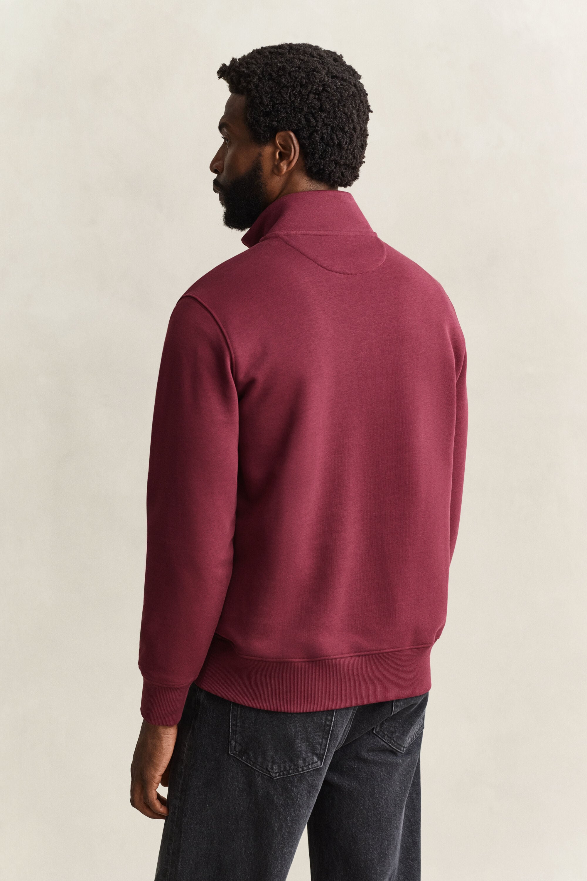 Sweat-shirt à demi-zip avec écusson