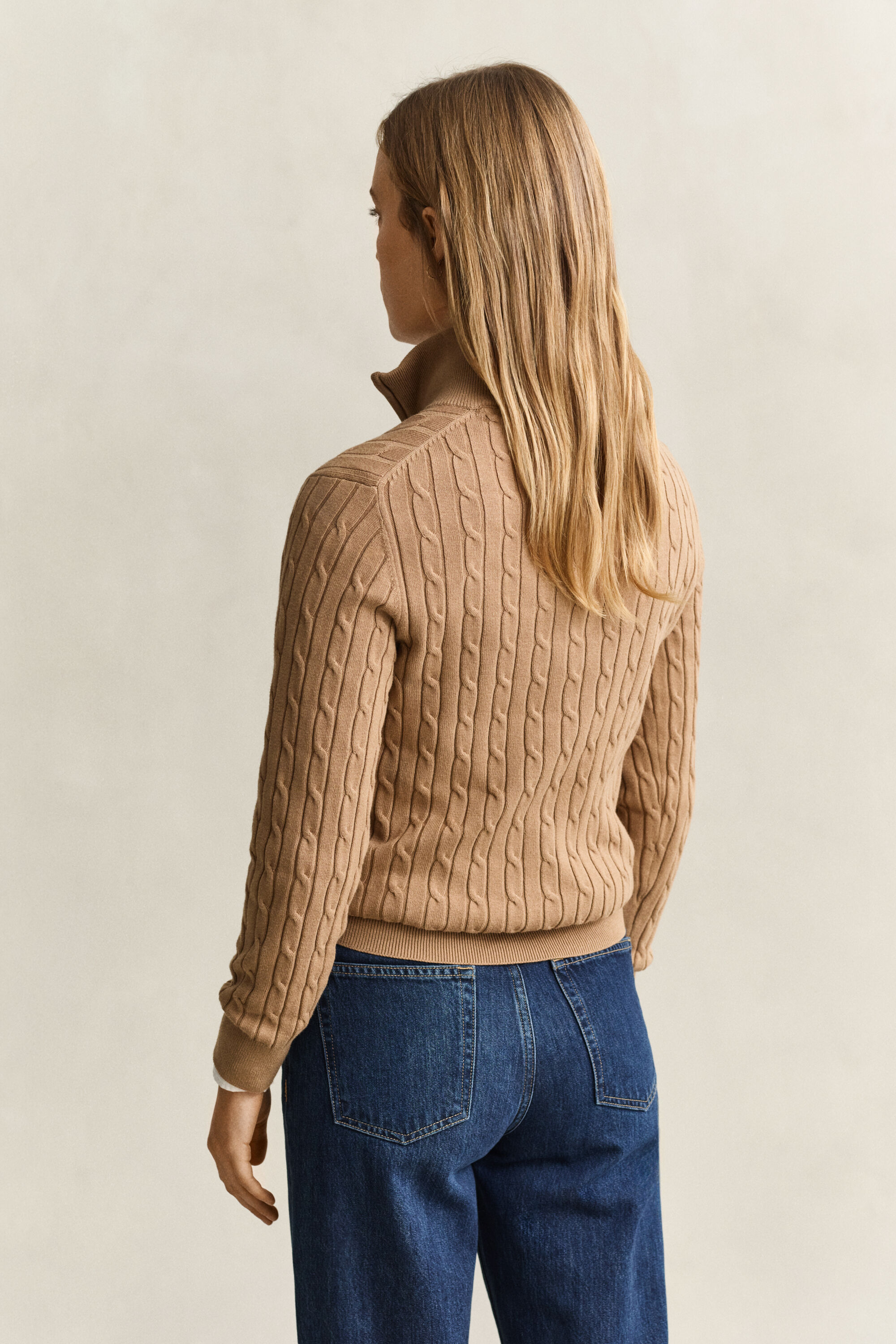 Pull à demi-zip en maille torsadée extensible