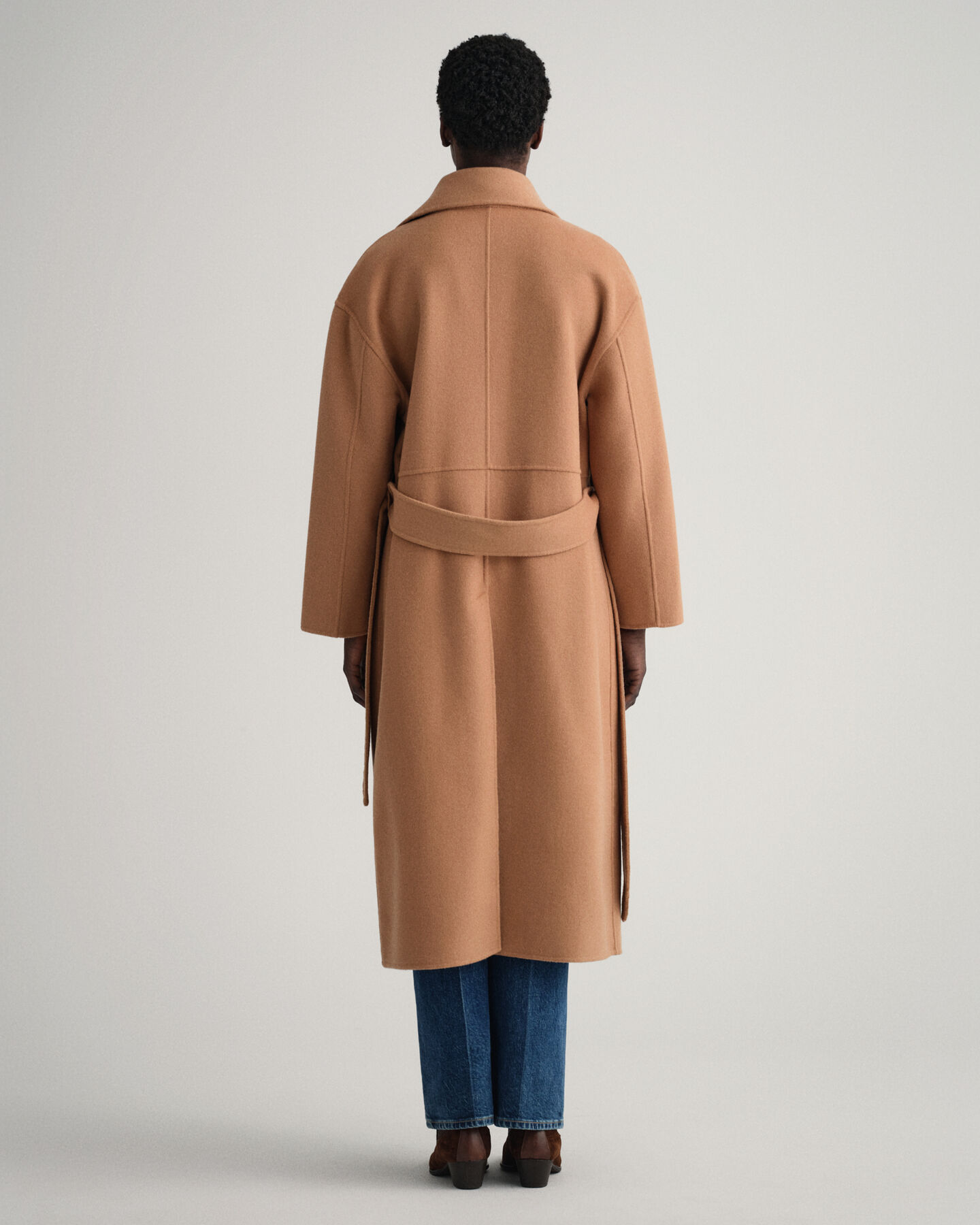 Manteau cousu main avec ceinture