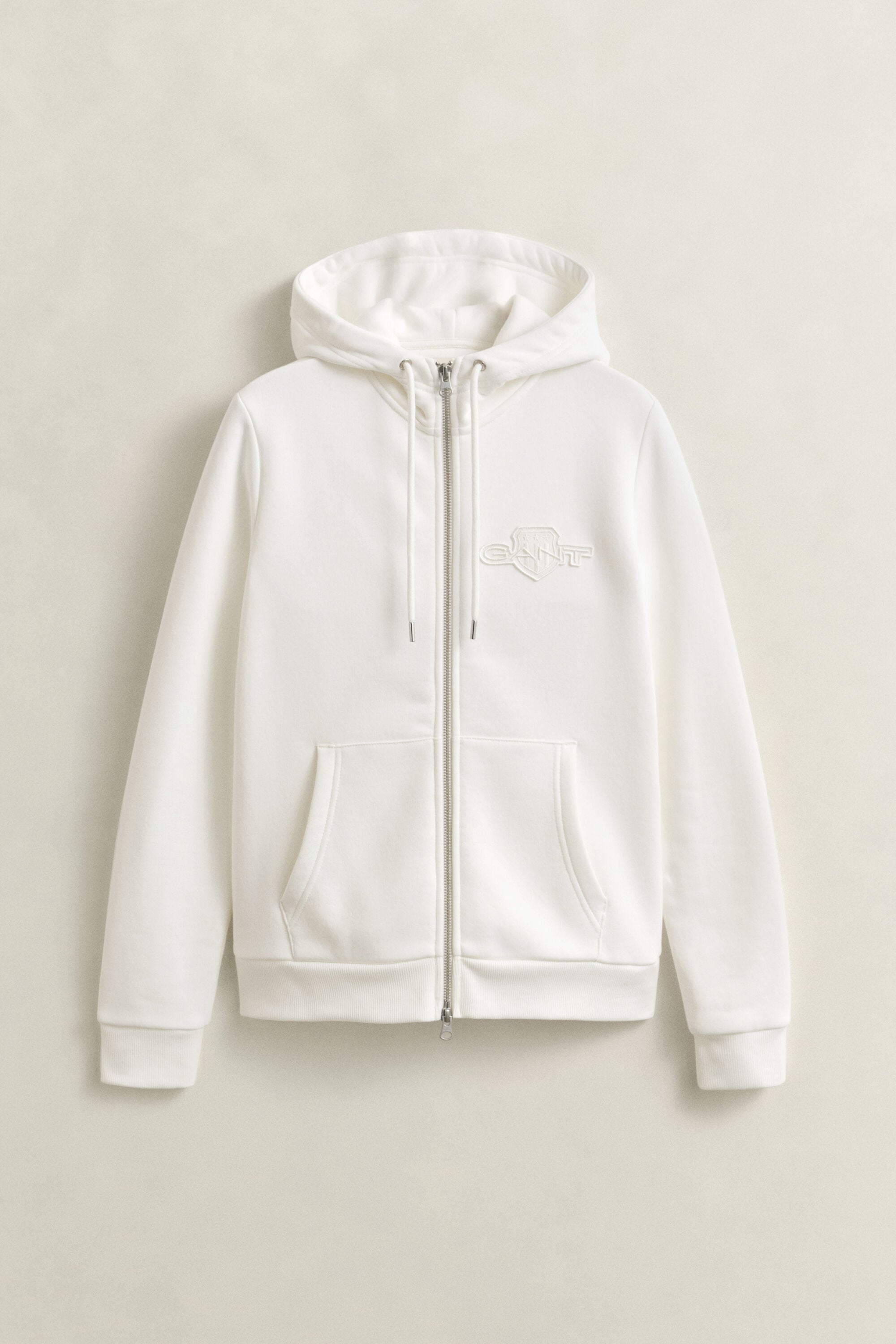 Sweat à capuche zippé avec écusson ton sur ton