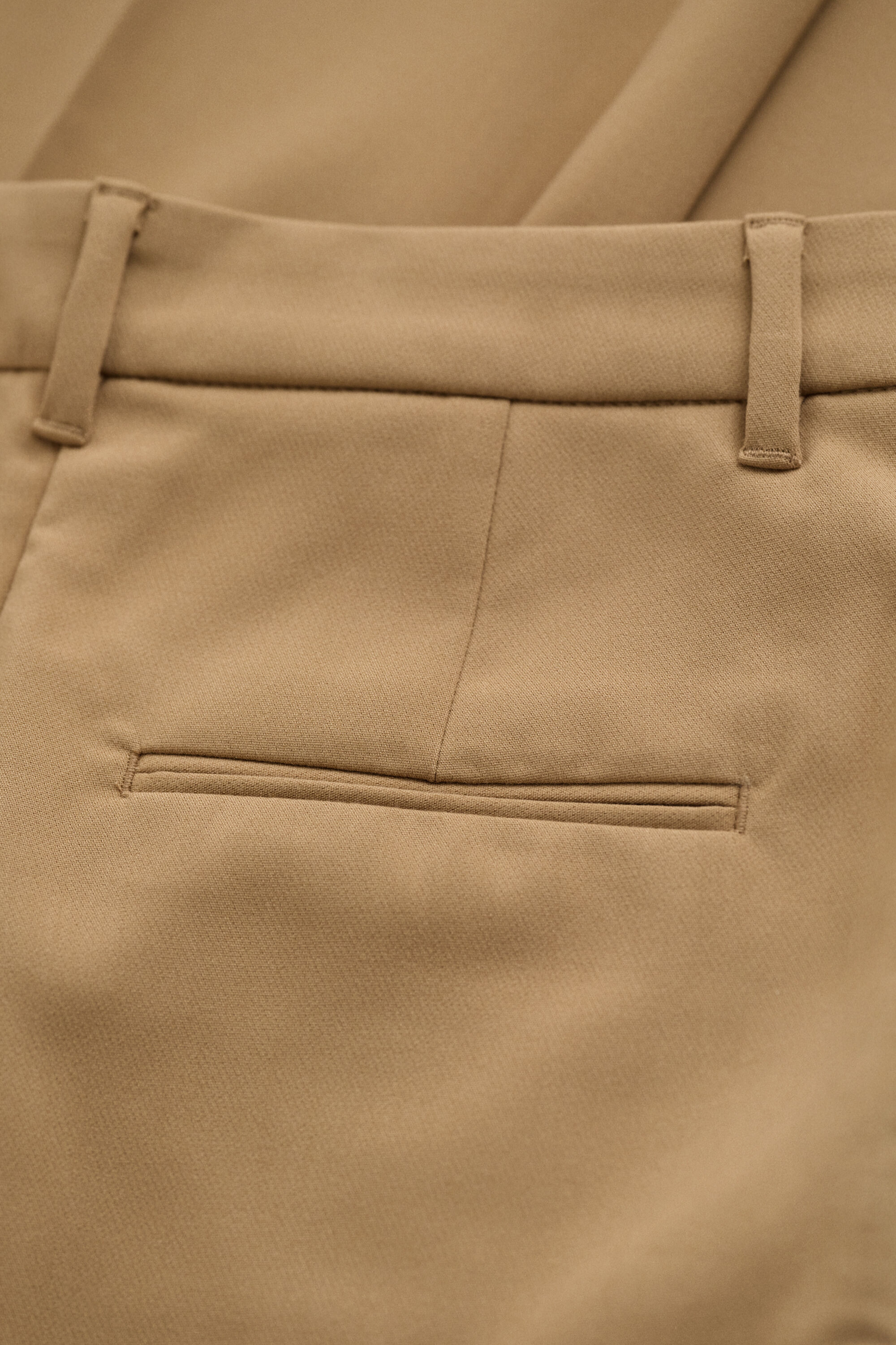 Pantalon coupe slim évasé