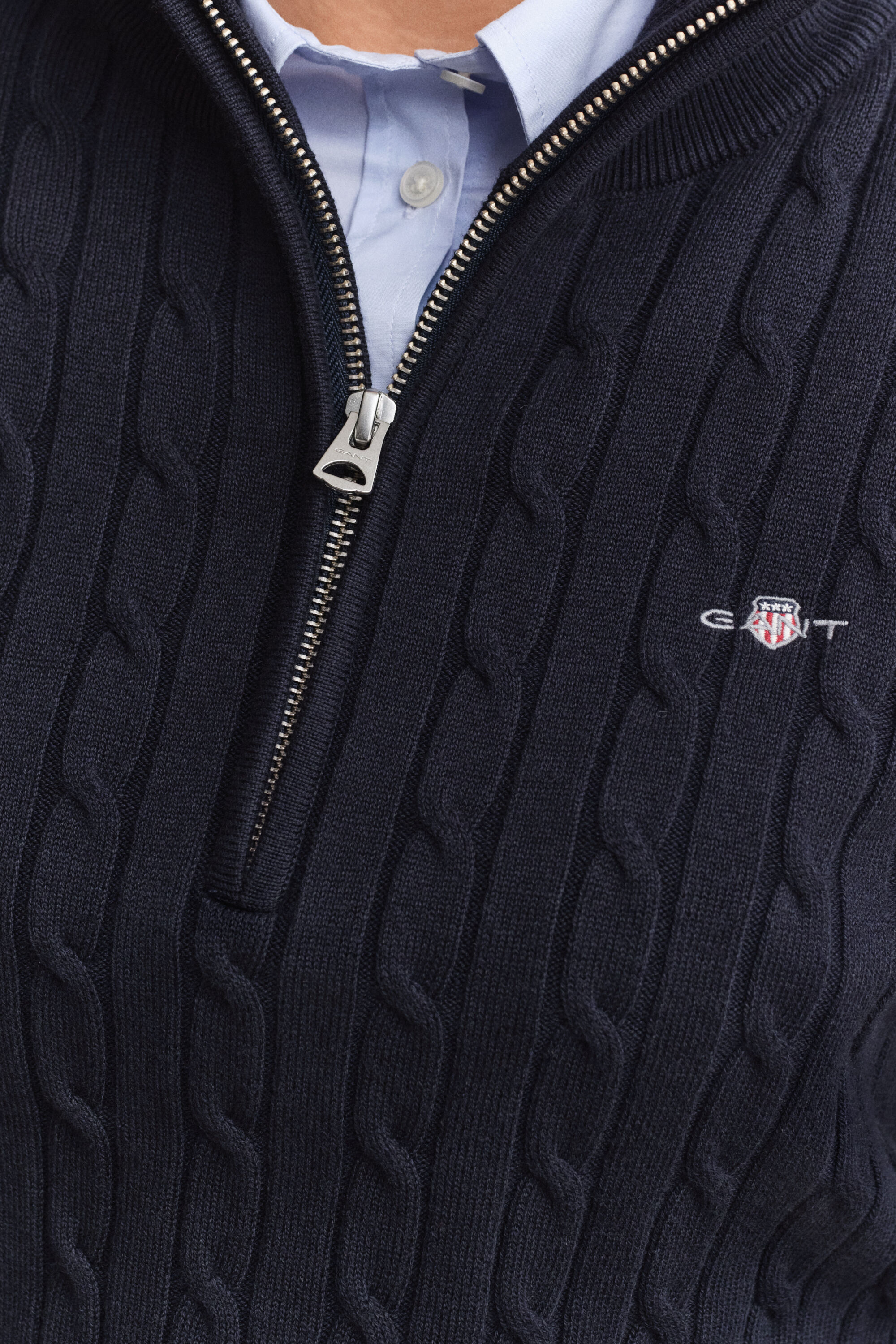 Pull à demi-zip en maille torsadée extensible
