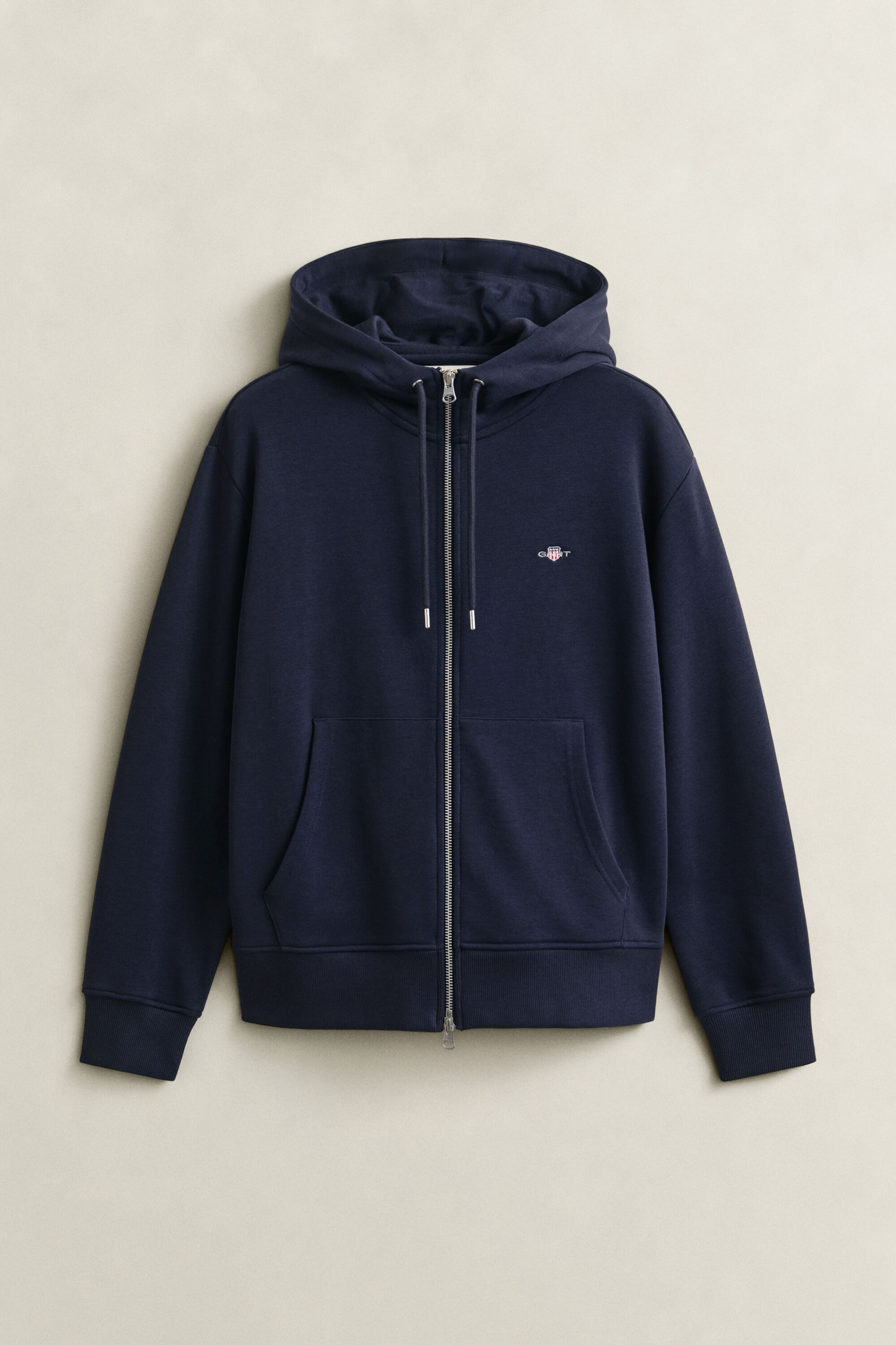 Sweat à capuche zippé avec écusson