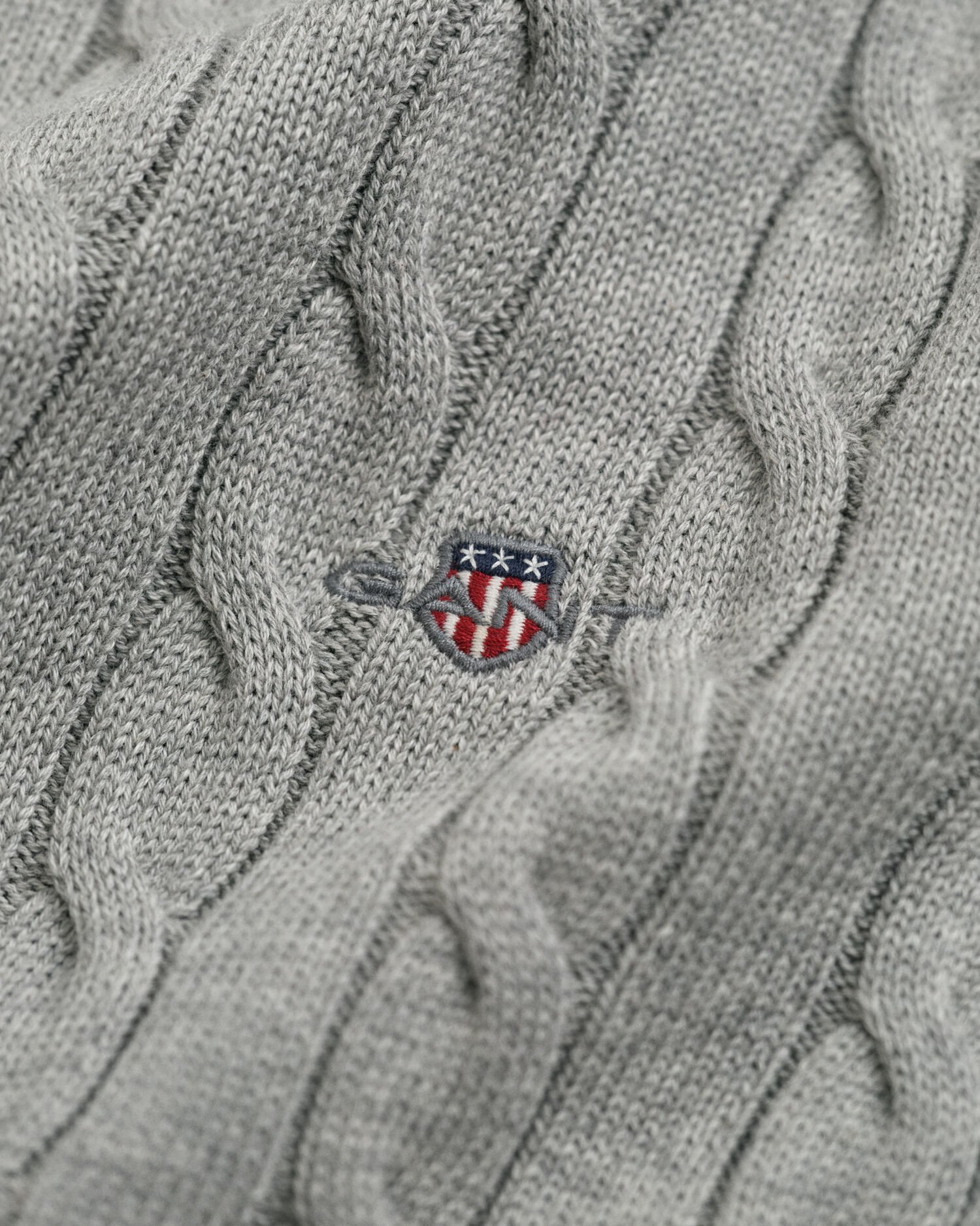 Pull col roulé en maille torsadée de coton