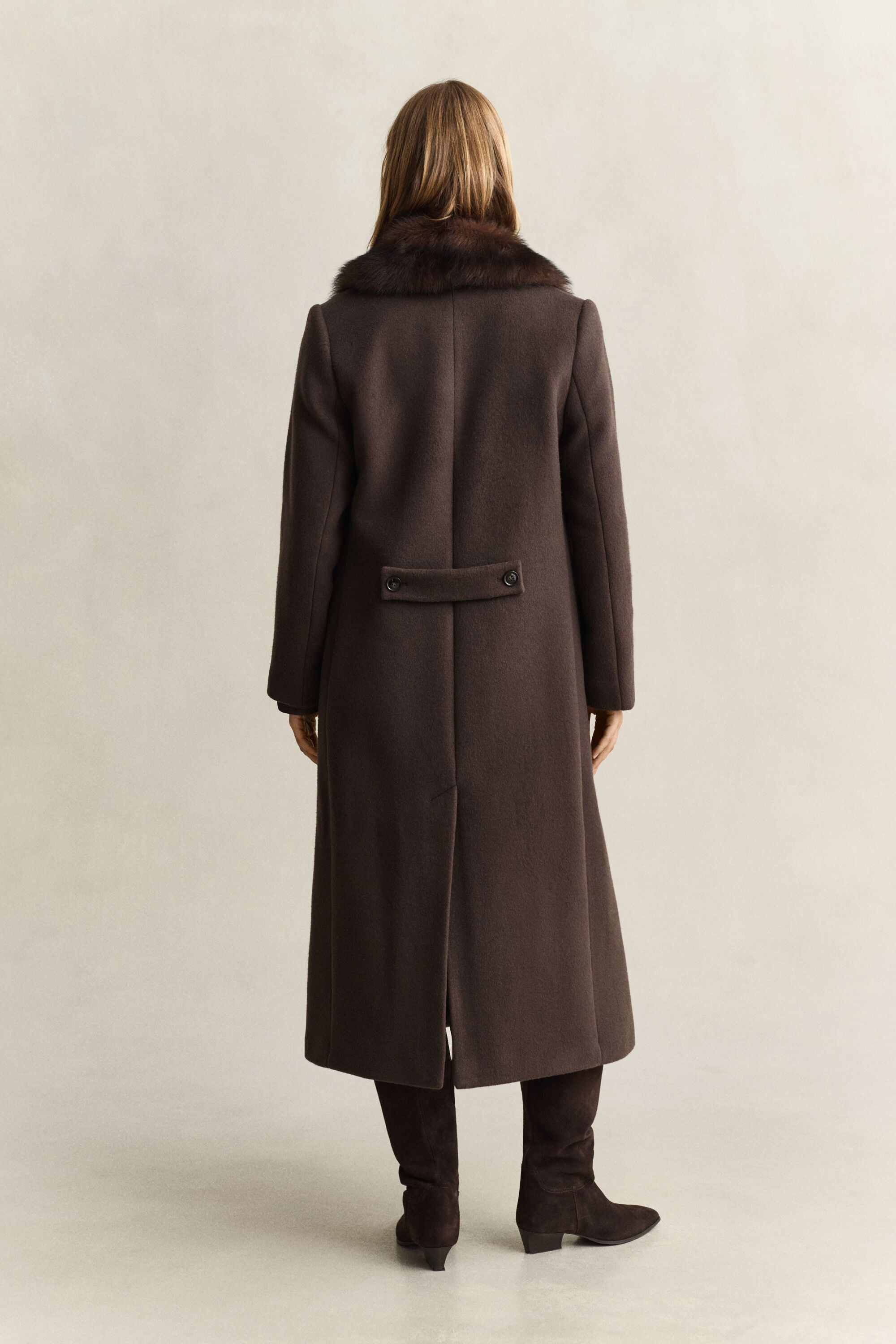 Manteau avec col en peau retournée