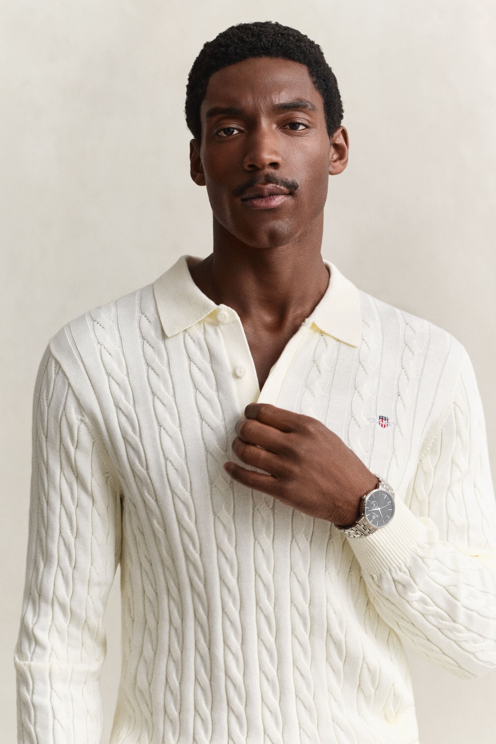 Pull façon polo en maille de coton à torsades