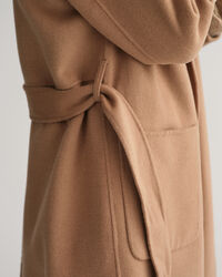 Manteau cousu main avec ceinture