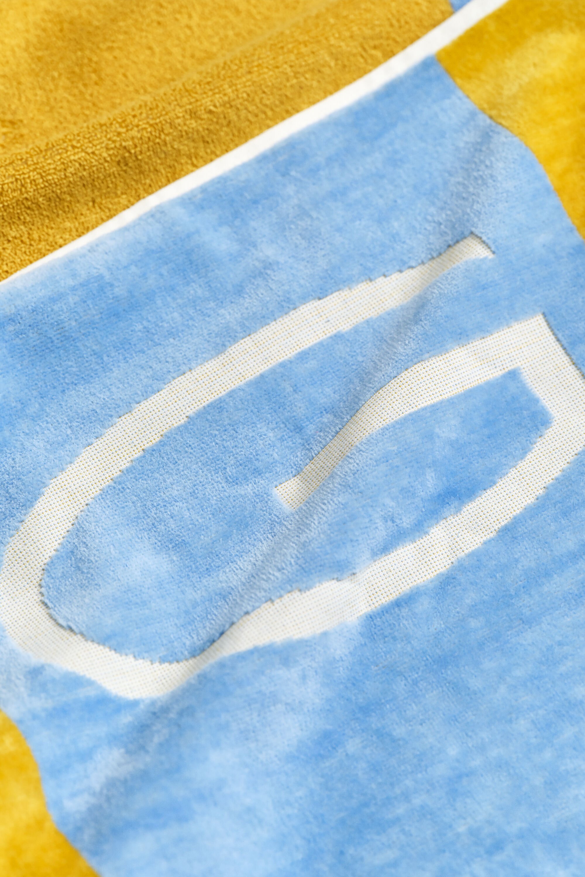 Serviette de plage à rayures en colour-block