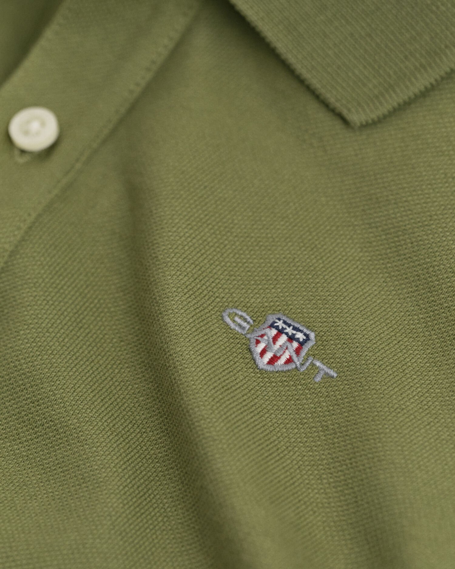 Polo en coton piqué à manches longues avec écusson Enfant