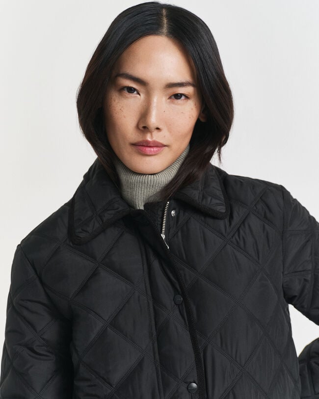 Veste matelassée avec bord en velours côtelé