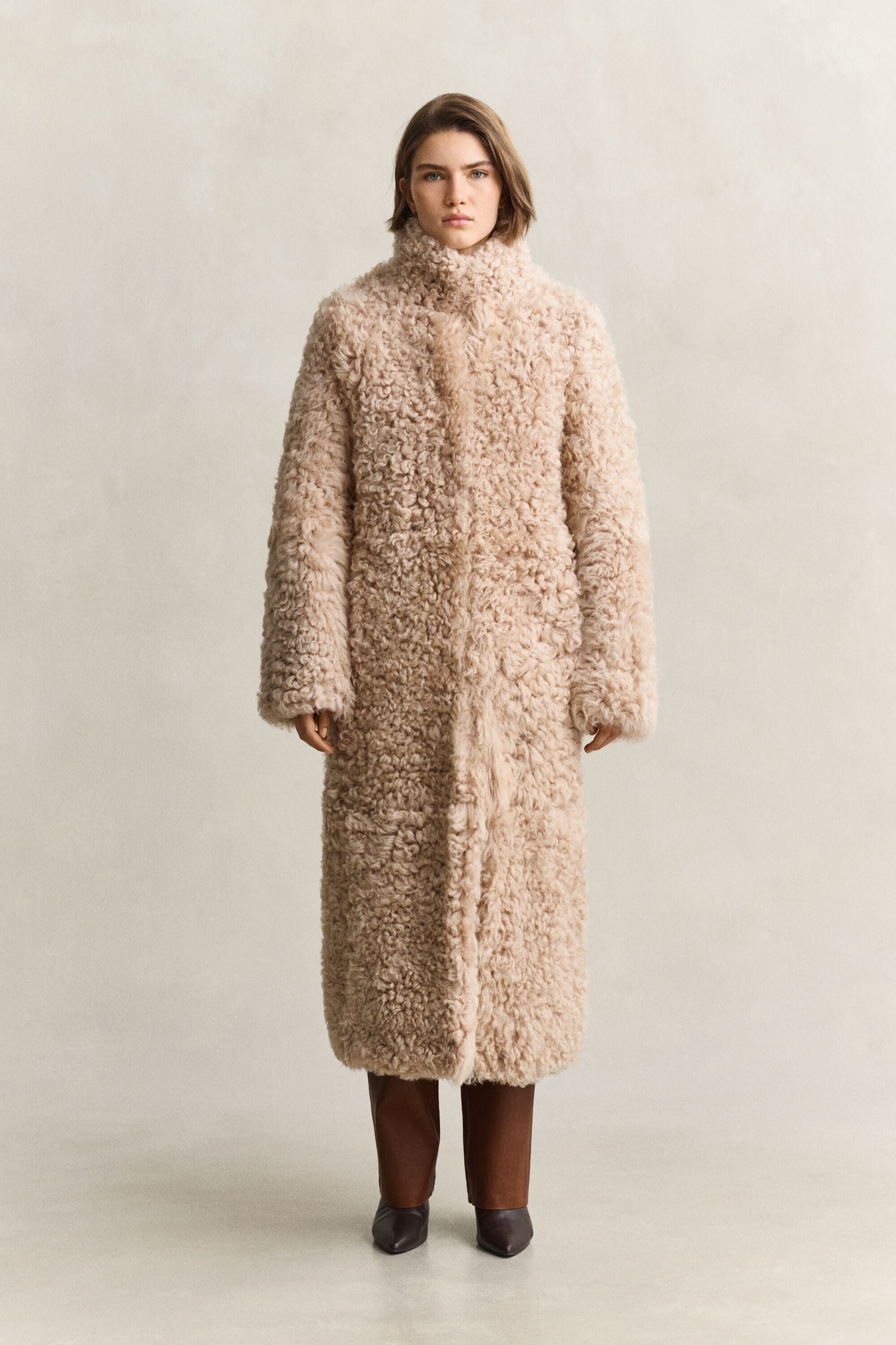 Manteau en peau lainée