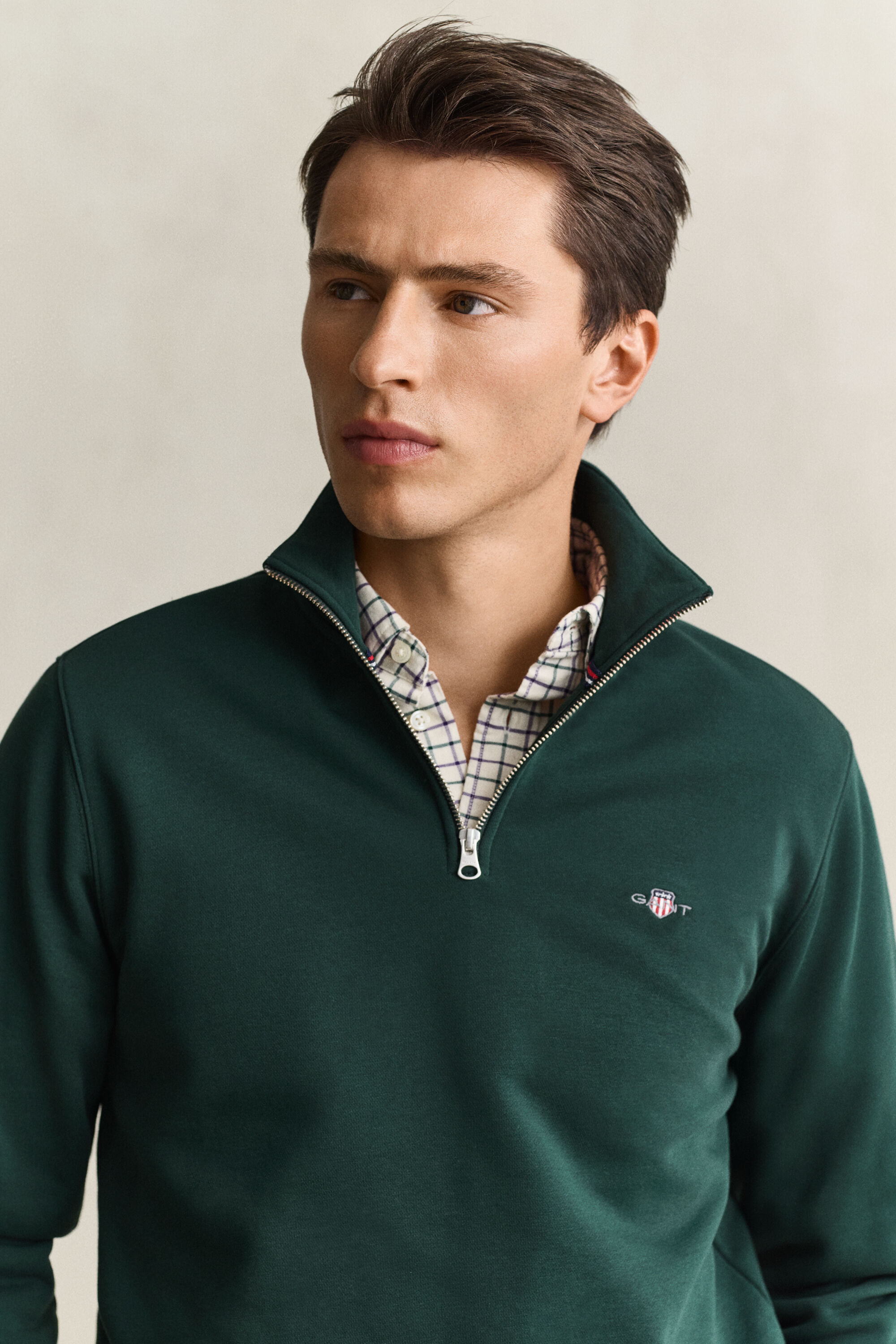 Sweat-shirt à demi-zip avec écusson