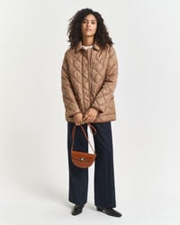 Veste matelassée avec bord en velours côtelé