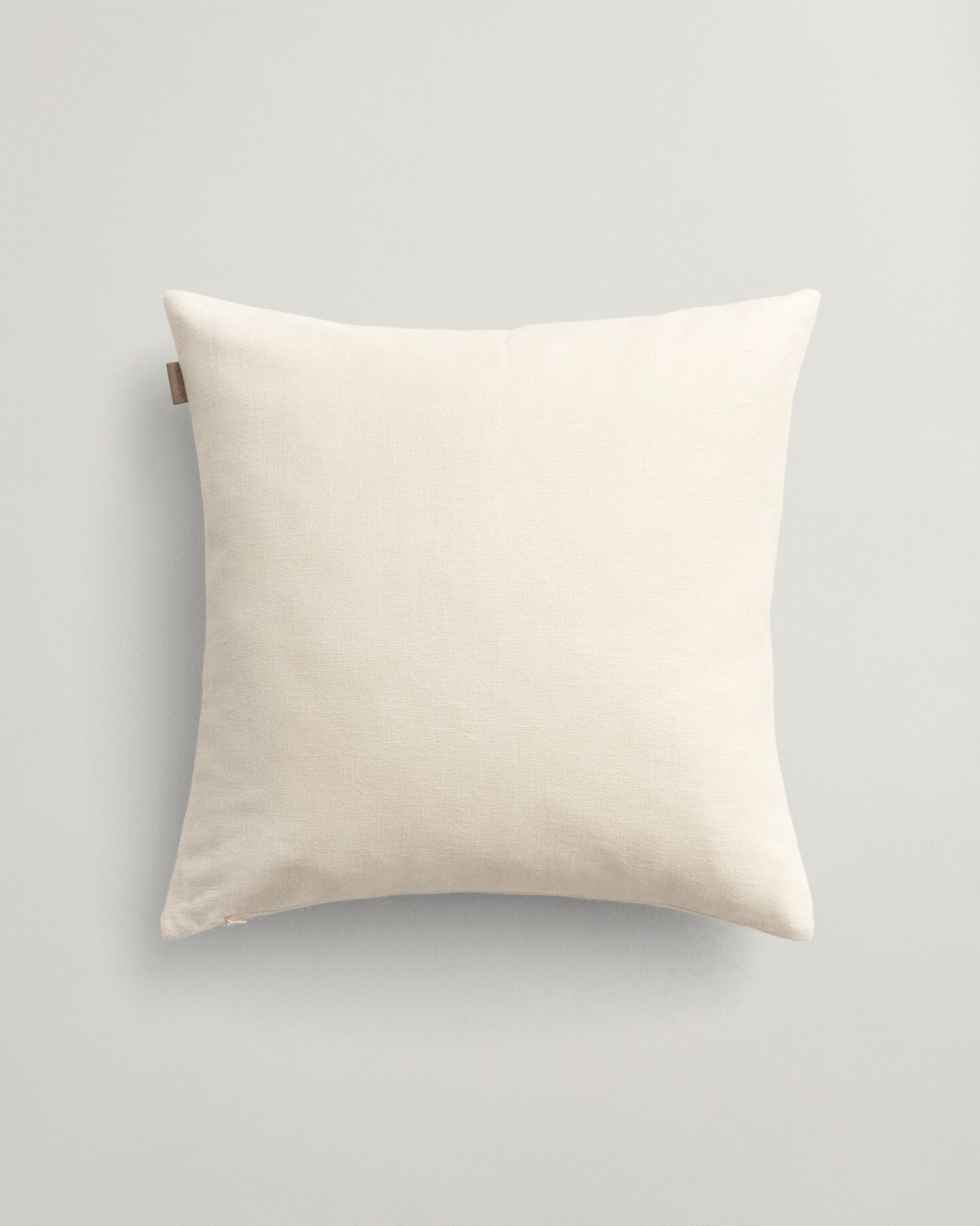 Housse de coussin Crest ton sur ton